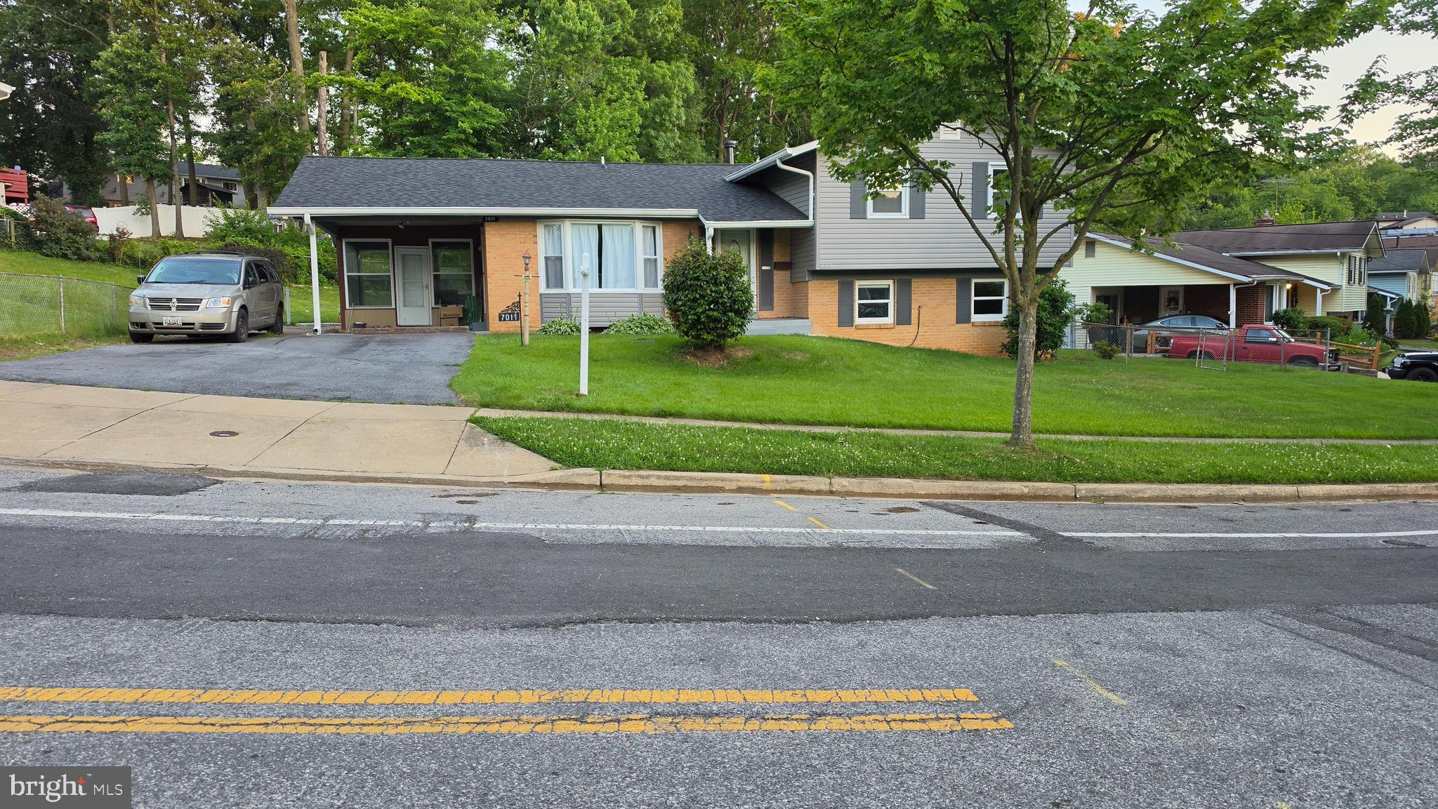 Newly renovated corner  Split levels with 5 bedrooms and 2 & half bathrooms. Home features a living room, dining room, kitchen island, enclosed porch, rec. room, fireplace, enclosed sunroom, fenced rear yard, a carport, and driveways for 5  cars.  New roof, new siding, new A/C unit, and new furnace. Home is near to  Shops, Malls, Metro bus,  New Carrollton Metro station, Mosque: Diyanet Center of America, PG Muslim Assoc., (PGMA), the New Robert Frost  Elementary School grades K-8, the University of MD College Park, NASA, Downtown DC, and the National Airport. The Property shows well, and any questions,  call the listing Co. and agent.