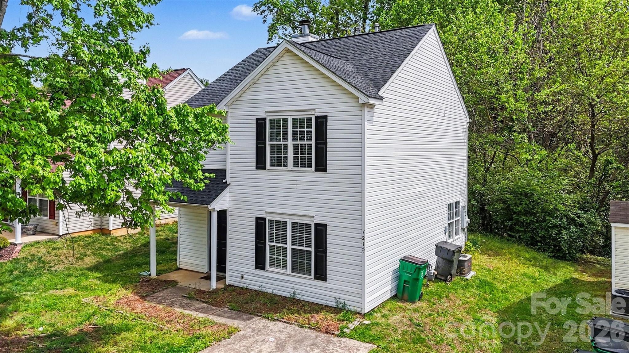 Welcome to this inviting two-story home tucked into a quiet, tree-lined setting in Griers Grove. With its charming front porch and classic exterior, the home offers a warm first impression that continues throughout the interior.Inside, you’ll find a bright and open main living area designed for both everyday comfort and easy entertaining. Natural light pours through large windows, highlighting the updated flooring and fresh, modern feel created by new paint and carpeting throughout. The living room centers around a cozy fireplace, creating an ideal gathering space, while the adjacent dining area flows seamlessly into the kitchen for a layout that feels both functional and connected.Upstairs, the bedrooms provide a peaceful retreat with soft natural light and comfortable proportions. The primary suite offers generous space and a walk-in closet, while additional rooms are perfect for guests, a home office, or flexible living needs.Step outside to a private, tree-lined backyard with a patio area that’s perfect for relaxing or hosting. The surrounding greenery adds a sense of privacy and calm, making the outdoor space feel like a natural extension of the home.Thoughtful updates bring added value and peace of mind, including a newer HVAC system installed in 2022 with regular servicing every six months, a roof replaced in 2025, and nearly all appliances updated within the past six months.Located in an established community with nearby green spaces, playgrounds, and walking areas, this home offers a balance of comfort, convenience, and neighborhood charm.