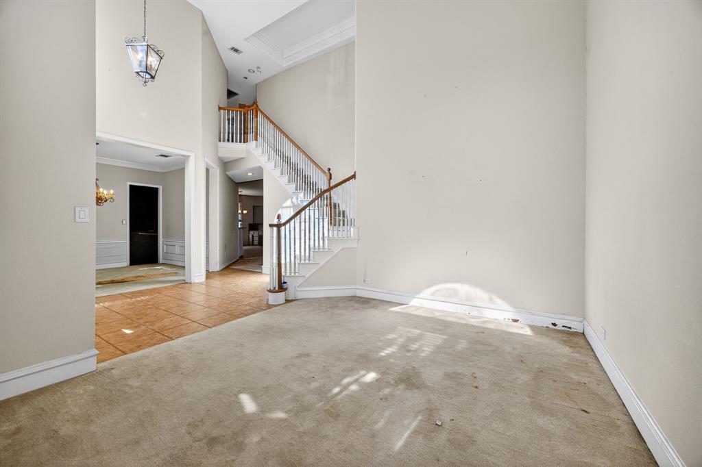 Exceptional opportunity awaits within Wolf Creek Estates. Situated on an oversized corner lot of more than a quarter-acre, this home offers over 3,800 sq ft of living space with an open and versatile floor plan. Featuring 5 bedrooms and 4 full bathrooms, this property is ready for your creative vision to restore it to its full potential. The home provides a true blank canvas—bring your ideas to make it shine. The expansive kitchen opens to the main living area, creating an ideal layout for gathering and entertaining. The primary suite is located on the second floor, offering privacy and generous space. Opportunities like this are rare—the possibilities are endless.