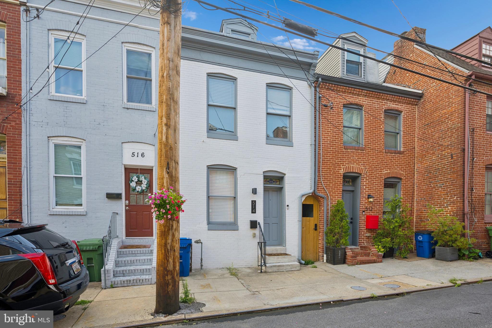 OCTOBER MOVE-IN SPECIAL!Move in by October 15th and receive 50% off of first month's rent! Welcome to 514 S. Dallas Street, where modern luxury meets timeless Baltimore charm. This exceptional 3-bedroom, 3-full-bath townhome has been meticulously maintained since its complete renovation in 2018.Step inside to gleaming hardwood floors, exposed brick accents, recessed lighting, and an abundance of natural light that create a warm and inviting atmosphere. The open-concept main level flows seamlessly into the gourmet kitchen, featuring granite countertops, stainless steel appliances, a gas range with range hood, floating wood shelving, and direct access to the rear deck, perfect for entertaining or enjoying your morning coffee.The first upper level offers two generously sized bedrooms, two full bathrooms, and a conveniently located laundry closet. One bedroom features vaulted ceilings with skylights, while the second includes an en-suite bath and ample closet space. The hallway bathroom is beautifully appointed with tile flooring, a frameless glass shower, rainfall showerhead, and classic subway tile.Occupying the entire top floor, the private primary suite is a true retreat. This spacious sanctuary boasts hardwood flooring, recessed lighting, a private rooftop deck with city views, and a luxurious spa-inspired bathroom complete with a dual vanity, soaking tub, and separate frameless glass shower.Ideally situated within walking distance of Little Italy, Harbor East, and Historic Fells Point, you'll enjoy some of Baltimore's finest restaurants, boutique shopping, parks, waterfront attractions, and nightlife just moments from your doorstep. With convenient access to major commuter routes and an unbeatable blend of style, comfort, and location, this stunning home is an exceptional rental opportunity.Can come furnished or unfurnished (living room couch, dining table, TV, 3 beds, 2 night stand, 1 dresser).