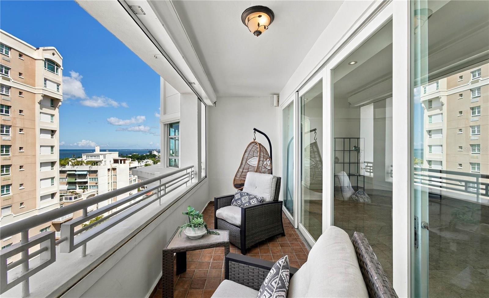 Situated just half a block from the beach, this contemporary residence at Marymar condominium offers an exclusive metropolitan lifestyle. The turnkey home is framed by stunning panoramic ocean and city views. Boasting an impressive total footprint of approx. 2,620 Sq. Ft., which includes a 2,511-Sq. Ft. interior and a 109-Sq. Ft. covered balcony overlooking Condado Beach's skyline. Upon entering the foyer, Apt. 1101’s airy ambiance is immediately enhanced by 9-foot ceilings and abundant natural light. The layout flows effortlessly into a graciously-sized living room that opens directly onto the alfresco space, perfect for seamless indoor-outdoor entertaining. Adjacent to the living area is an expansive gourmet Italian kitchen. Outfitted with a large center peninsula, stainless steel appliances and wood cabinetry, situated right next to a dedicated dining room. The home features 3 bedrooms and 2.5 bathrooms, thoughtfully arranged for optimal privacy. The primary bedroom is accented by a private spa-inspired bath and custom dual walk-in closets. This rare to market offering is rounded out by 3 garaged parking spaces. Marymar condominium features only two residences per floor alongside premier amenities, such as a concierge and fitness center. Located in CoBe near St. Johns and Robinson School, in addition to top restaurants, hospital, supermarkets, shopping establishments and entertainment venues. Within close proximity to the beach and a variety of aquatic activities. Moments away from the Miramar Arts District, Old San Juan and Isla Verde.
