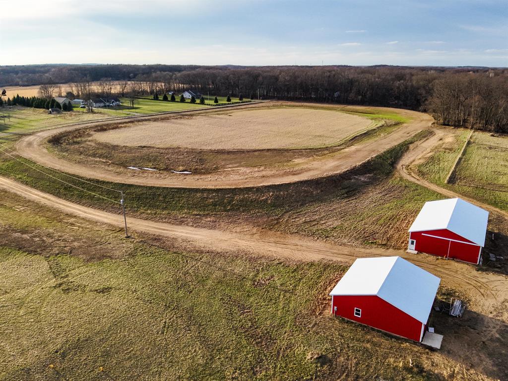 Located in Ingham County near Dansville, this 43+/-acre property offers a rare combination of equestrian functionality, established infrastructure, and premium wildlife habitat. With a diverse landscape and direct access to expansive public land, this property is well-suited for horse enthusiasts, hunters, and those looking to build in a private rural setting.This is an excellent horse property featuring a well-established half-mile+/- training track and fenced pasture areas ready for immediate use. The gently rolling terrain supports training, grazing, and expansion for equestrian operations. The layout and improvements make this property highly functional for both rec and agricultural use.The land includes approximately 22 acres of rolling hayfields, about 8 acres of mature hardwood timber in the northeast corner, and a mix of wetlands and marsh habitat. The southern portion of the property contains a defined wetland and natural deer bedding area, creating ideal conditionfor holding wildlife. This diversity of habitat significantly enhances the property's appeal for hunting.This is an excellent hunting property with a strong deer presence. The combination of hardwoods, bedding cover, water sources, and nearby agriculture creates a consistent travel corridor and feeding pattern for whitetail deer. Turkey and other small game are also present, making this a well-rounded recreational tract.A major highlight is that the property borders the Dansville State Game Area, providing direct access to thousands of acres of additional public hunting land. This significantly expands hunting opportunities and long-term value.The property includes two pole barns built in 2018. An approximate 40' x 40' barn features a 200-amp electrical service and roll-up door, while the approximate 40' x 60' barn provides ample storage with sliding doors and an entry door. These structures offer flexibility for equipment, livestock, or workshop space.A functioning on-site well is already in place, adding utility and supporting future deve Current use is Agricultural,Farm,Hunting,Recreational.