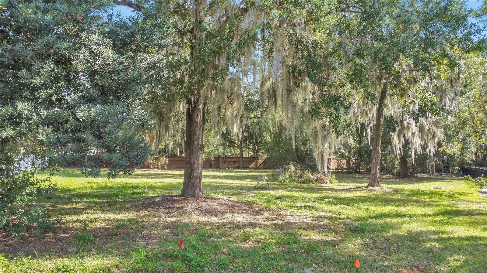 Tucked away at the end of a quiet cul-de-sac, this nearly half-acre lot on Lazy Oaks Lane offers a rare opportunity to build in an established Orlando pocket. The oversized footprint provides flexibility for a custom home, outdoor living, or both—without feeling boxed in by neighboring properties. Centrally located with easy access to major roads, shopping, dining, and downtown Orlando, this is the kind of lot that doesn’t come along often.