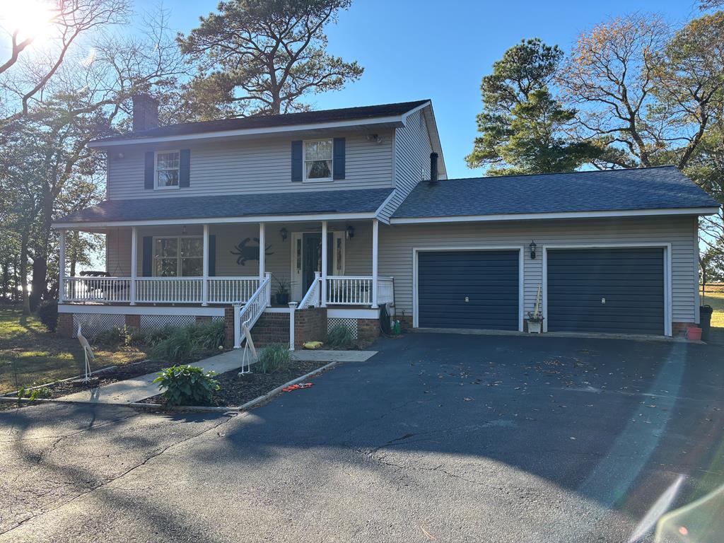 OPEN HOUSE, JAN. 3rd 11:00am - 1pm. Sunsets await you in this 3 bed, 2 1/2 bath Chesapeake Bay front home built by Tommy Arnold!  Beautiful hardwood floors, dual floor air units, 2 new Anderson sliding glass doors, Azek porch decking, and Culligan water softener.  Property even comes with new pets - deer!  Vaucluse Shores amenities include boat ramp, beach, pool, exercise room, tennis/pickleball courts, and club house.  Come enjoy the Eastern Shore!