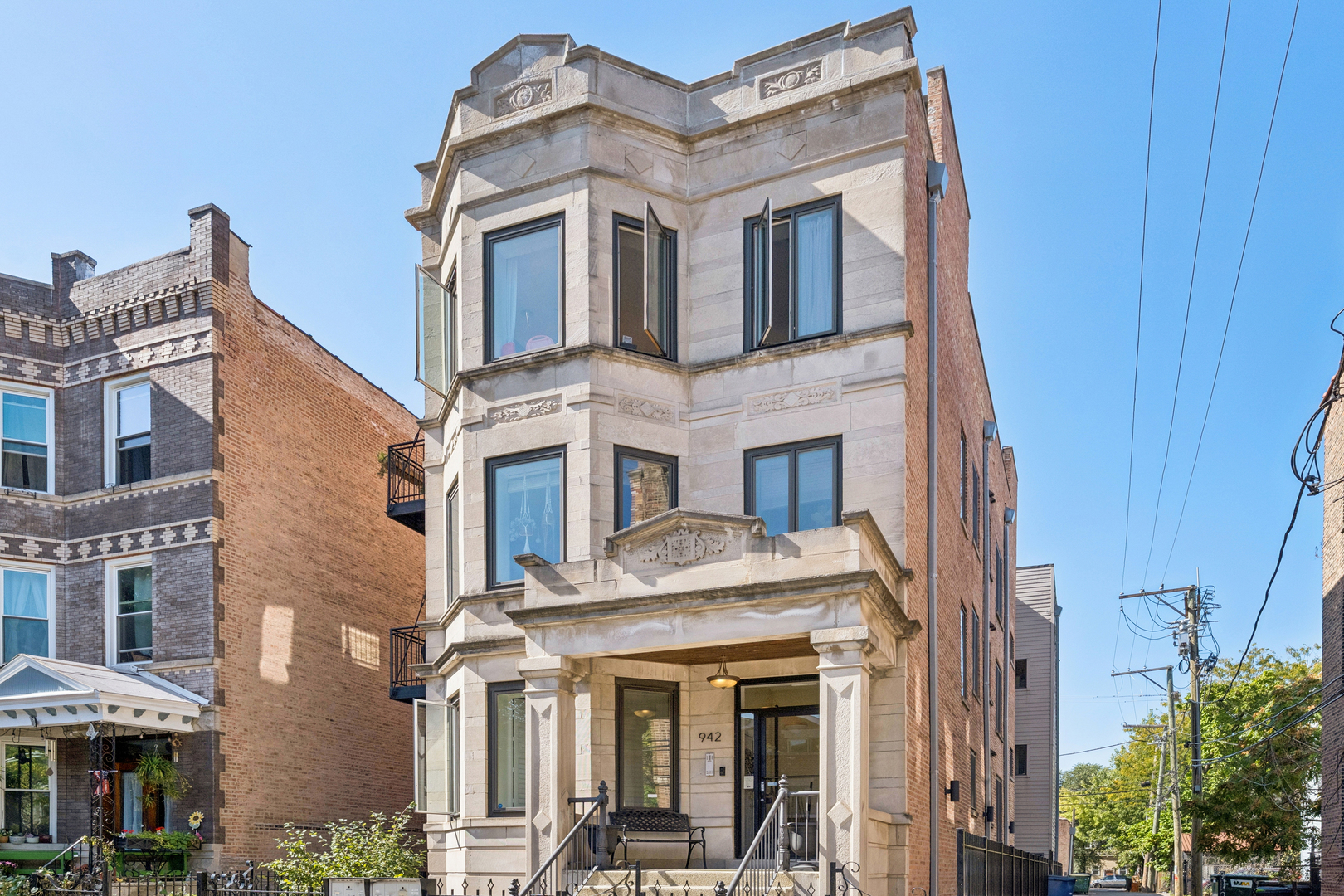 This Ukrainian Village/Smith Park area = condo features a private roof top pace with gorgeous skyline views, designated parking spot, and in-unit laundry. The unit features new Pella windows, hardwood floors, beautiful tile work throughout, and designer kitchen with walnut cabinets, granite counter and matching backsplash, breakfast bar, SS appliances, and externally vented hood over stove. Bathrooms have plenty of counter and storage space, detailed tile work, and jacuzzi tubs in both. HVAC was fully replaced in 2019. Located only one stop away from downtown's Union Station on Metra which is a 20min walk away. Near the California corridor with lots of resturants and bars, and walking distance to Humboldt Park and Smith Park (with tennis courts, cafe, lagoon, playground, fishing, trails, baseball fields, etc.).