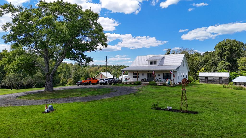 Charming 2 Story Home located at 3885 Ayers Orchard Rd, Stuart, VA 24171. Country living meets modern comfort on this beautifully remodeled 2-story home, situated on 2.21acres  of rolling open and wooded land with frontage on a state-paved road. Completely remodeled 2021–2023, the home was taken down to the studs, ceilings were raised, and the roof lifted to add more height for the upstairs bedrooms. Exterior composite plastic siding and two heat pumps (one per level) provide modern efficiency. Main Level: Spacious Kitchen with center island, open dining room, inviting living room, foyer/office, half bath, bonus room with exterior access, laundry, and spacious master suite with en-suite bath. Second Level: Large Landing area, full bath, and two bedrooms.  The property also includes the original home (14' x 20') just located behind the main house where the sellers lived until the main home was completed; it could be used as a guest residence with open living space, kitchen, bedroom, and bath. Perfect for visitors or in-laws. Wooden Storage building with metal roof.  10 minutes to Stuart, VA. 30 minutes to Martinsville, VA. 35 Minutes to Meadows of Dan, VA and the Blue Ridge Parkway. 50 minutes to Floyd, VA. 40 minutes to Mt. Airy, NC. 1 hour to Hillsville, VA and Interstate I-77.