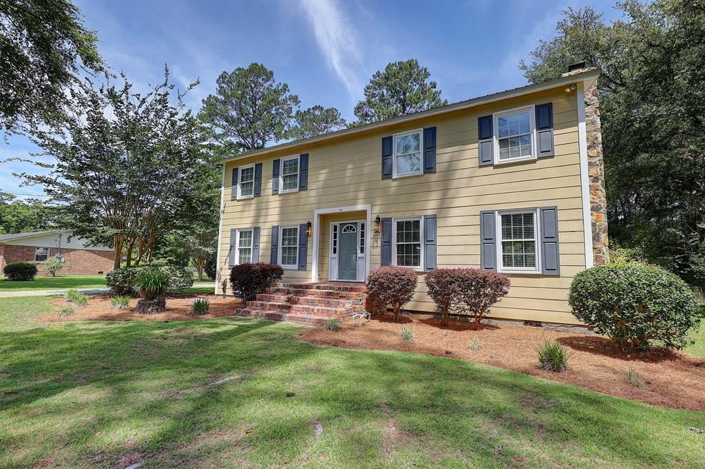 This charming two-story home in the Tall Pines subdivision of Thomasville, Georgia, is nestled on a desirable .74-acre lot within a welcoming community surrounding a prestigious private school. Featuring four spacious bedrooms and three full bathrooms, the home boasts an open-concept living room with large windows, an adjacent dining area perfect for entertaining, and a convenient mudroom. Outdoor highlights include a versatile covered garage area that can double as an outdoor living space and a cozy backyard ideal for landscaping, gardening, or recreation. With a manageable lot size, this property offers ample room for outdoor activities without extensive upkeep. Nearby amenities include parks, shopping centers, and dining options, making it perfect for families seeking both comfort and convenience. For more details or to schedule a viewing, please contact your favorite agent today. To view a 3D tour please copy and paste the link below:  https://my.matterport.com/show/?m=vQo7Vha7kFE&brand=0