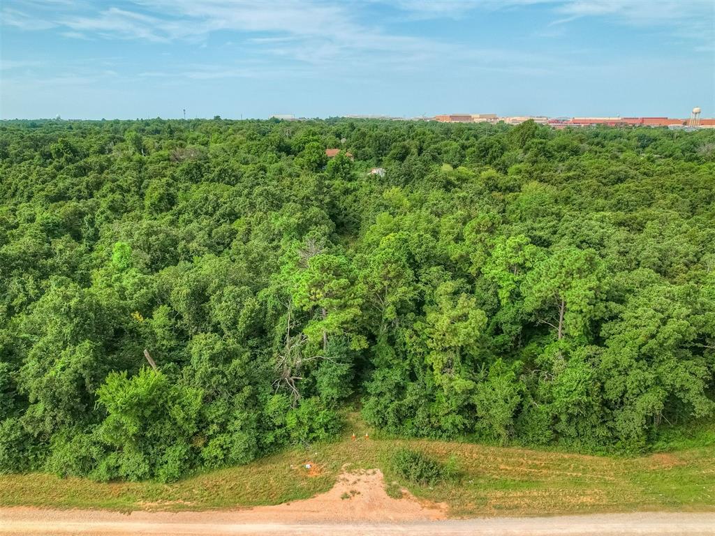 I-40 FRONTAGE - 713 ft. (mol). POTENTIAL COMMERCIAL PROPERTY. Great location for your business. Located close to major hospital/medical center, shopping, schools and TAFB. Call me to schedule a private showing.
Crutcho creek runs through the east side of the property. That section is in a flood zone.