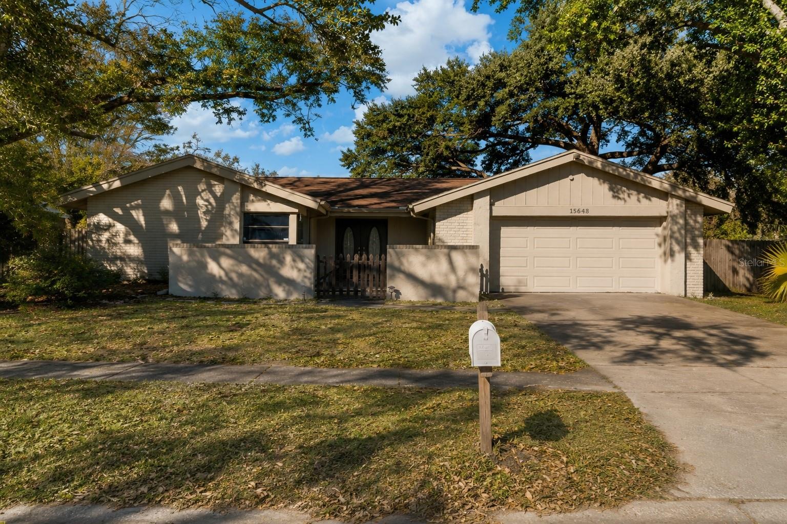 Welcome to 15648 Bear Creek Dr, a 4-bedroom, 2.5-bath home located on a corner lot in the sought-after Northdale area with no HOA or CDD. Offering 1,694 sq ft of living space, this property provides a functional layout ideal for both everyday living and entertaining. The home features a freshly repainted interior, a 2-car garage, a large screened lanai, and a spacious fully fenced backyard with plenty of room to add a pool or create your ideal outdoor space. A storage shed adds extra convenience and flexibility. For added peace of mind, a brand-new roof will be installed prior to closing. Priced at an attractive $460,000, this home presents an outstanding value in one of Tampa's most desirable neighborhoods. Enjoy an exceptional location just minutes from Northdale Golf & Tennis Club, as well as nearby shopping, restaurants, the YMCA, EOS Fitness, and Northdale Park trails. The home is also conveniently located near top-rated schools and offers easy access to Downtown Tampa (approximately 20–25 minutes) and Tampa International Airport (about 15–20 minutes). This is a rare opportunity to own a well-located home with space, freedom, and accessibility in one of Northdale’s most desirable communities.
