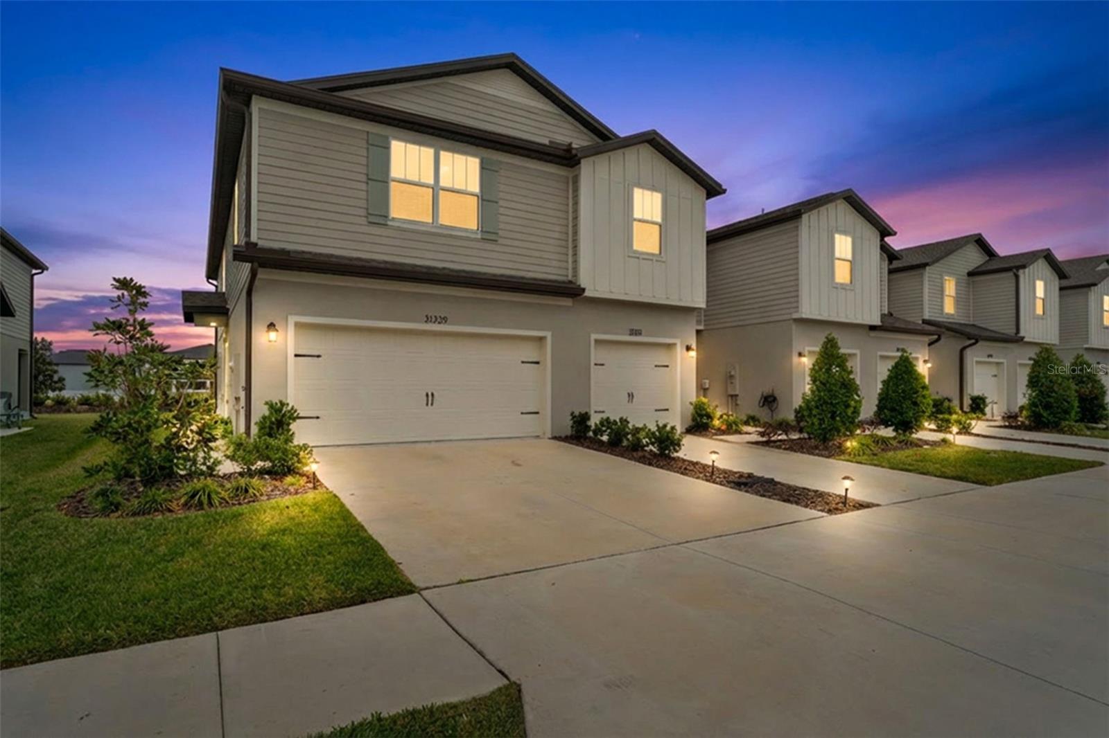 One or more photo(s) has been virtually staged. RESORT-STYLE LIVING WITHOUT THE MAINTENANCE—YES, IT’S A THING. BUILT IN 2023, this 3 BEDROOM, 2.5 BATH townhome with a 2-CAR GARAGE delivers the kind of lifestyle that actually feels like a getaway. Located in Wesley Reserve at Chapel Crossing, this is LOW-MAINTENANCE living done right, with an HOA that takes care of the exterior so you can enjoy your time instead of spending it on yard work.Inside, the layout is light, modern, and easy to live in, featuring 18X18 TILE FLOORING throughout the main living areas, an OPEN-CONCEPT KITCHEN with WHITE CABINETRY, GRANITE COUNTERTOPS, and STAINLESS-STEEL APPLIANCES, plus a smart upstairs layout that keeps all bedrooms together with a conveniently located laundry area. It would be a crime for you not to see the MASSIVE owner's suite closet...and ensuite bathroom. And then there are the amenities—because they’re a big deal here. Enjoy a RESORT-STYLE POOL WITH BEACH ENTRY, a LAZY RIVER, FITNESS CENTER, and CLUBHOUSE. It truly feels like being on vacation, except this is home.Ideally located in Wesley Chapel with easy access to shopping, dining, and major highways, this nearly-new townhome is perfect for anyone who wants STYLE, CONVENIENCE, and A LOCK-AND-LEAVE LIFESTYLE.