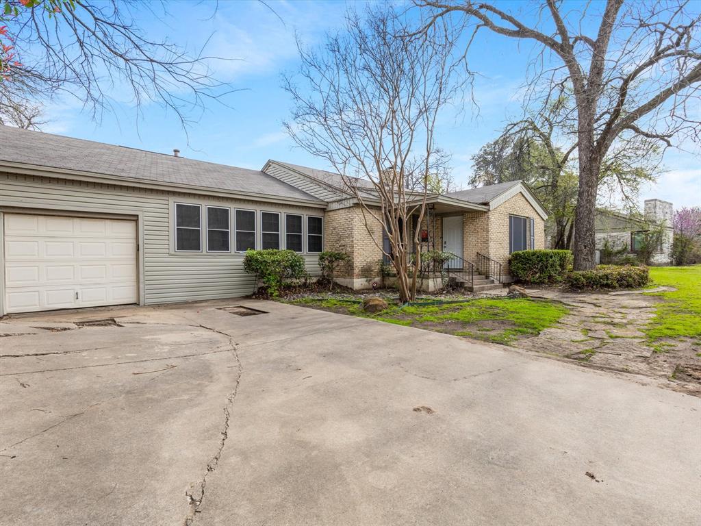 Location! Location! Location! Home is located in the TCU Overlay-Grandfathered currently for 5 tenants.  New owner would need to re-register within 10 days of purchase to maintain grandfathered status. One-story home in close proximity to TCU, restaurants, Foster Park, Trinity Trails & grocery store. Prime location and charming details in the current floorplan or an ideal homesite for a new build. Lots of great storage, kitchen island, decorative fireplace and large backyard space are just some of the items to note!  Current lease ends May 20, 2026.