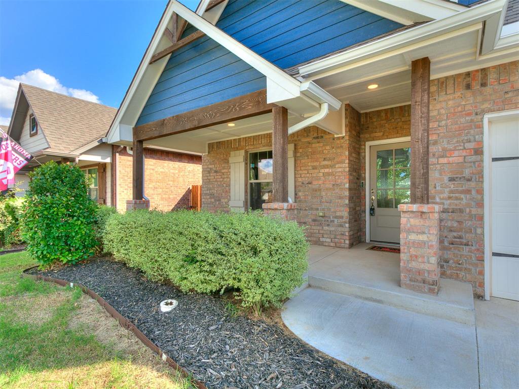 This home greets you with a covered front porch perfect for your morning coffee and features 4 bedrooms, 3 bathrooms, and a huge bonus space. The kitchen is beautiful with an oversized island, granite countertops, a great pantry and built-in stainless steel appliances. The cabinets extend to the ceiling providing extra storage. The living room is open to the kitchen and dining and features a gas log fireplace. Wood-look tile is throughout all the entire main floor. The primary bedroom is spacious with two large closets. The en-suite features a jetted tub, large walk-in shower and double vanities. The additional 3 bedrooms are a generous size and are all located on the first floor. Upstairs is an oversized bonus space with a full bathroom and closet. This home is not short on storage with a great laundry room and under the stairs closet. The backyard features a large covered patio with a fireplace and still provides plenty of yard space. Cedar Lane is located in a great location close to the University of Oklahoma and quick access to I-35. The neighborhood amenities include a community pool, playground, walking trails and more!