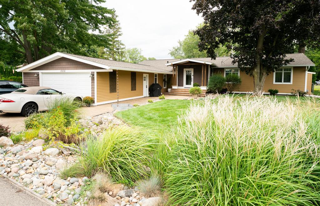 Experience refined lake living on a rare double lot. Designed for relaxed luxury living and sophisticated entertaining. Every detail has been thoughtfully curated with high end finishes throughout. The split layout offers a private guest area with 3 boutique style bedrooms and a designer bath. The owners suite features a spacious bedroom, luxury bathroom, walk-in closet and a versatile second living area, perfect as a family room, office, gym, or 5th bedroom. The chefs kitchen anchors the home with a 36' gas range, 240v Advantium oven, smart fridge and silent dishwasher, custom Omega cabinetry and walk-in pantry. Enjoy effortless entertaining in the screened porch with beverage fridges and projector or move outside to the Italian inspired garden with a wood fired oven and outdoor dining. Pro landscaping with irrigation system, 142' steel seawall, paved driveway and front courtyard, extra RV/boat parking Ev charge station in garage and waterfront deck complete this exceptional propertyExperience refined lake living on a rare double lot. Designed for relaxed luxury and sophisticated entertaining, every detail has been thoughtfully curated with high end finishes throughout.  The split layout offers a private guest area with 3 boutique style bedrooms and a designer bath.  The owners suite features a spacious bedroom, luxury bathroom, walk-in closet and a versatile second living area--perfect as a family room, office, gym, or 5th bedroom. The chefs kitchen anchors the home with a 36" gas range, 240v Advantium oven, smart fridge and silent dishwasher, custom Omega cabinetry and walk-in pantry. Enjoy effortless entertaining in the screened porch with beverage fridges and projector or move outside to the Italian inspired garden with a wood fired oven and outdoor dining. Pro landscaping with irrigation system, 142' steel seawall, paved driveway and courtyard, extra RV/boat parking Ev charge station and waterfront deck complete this exceptional property