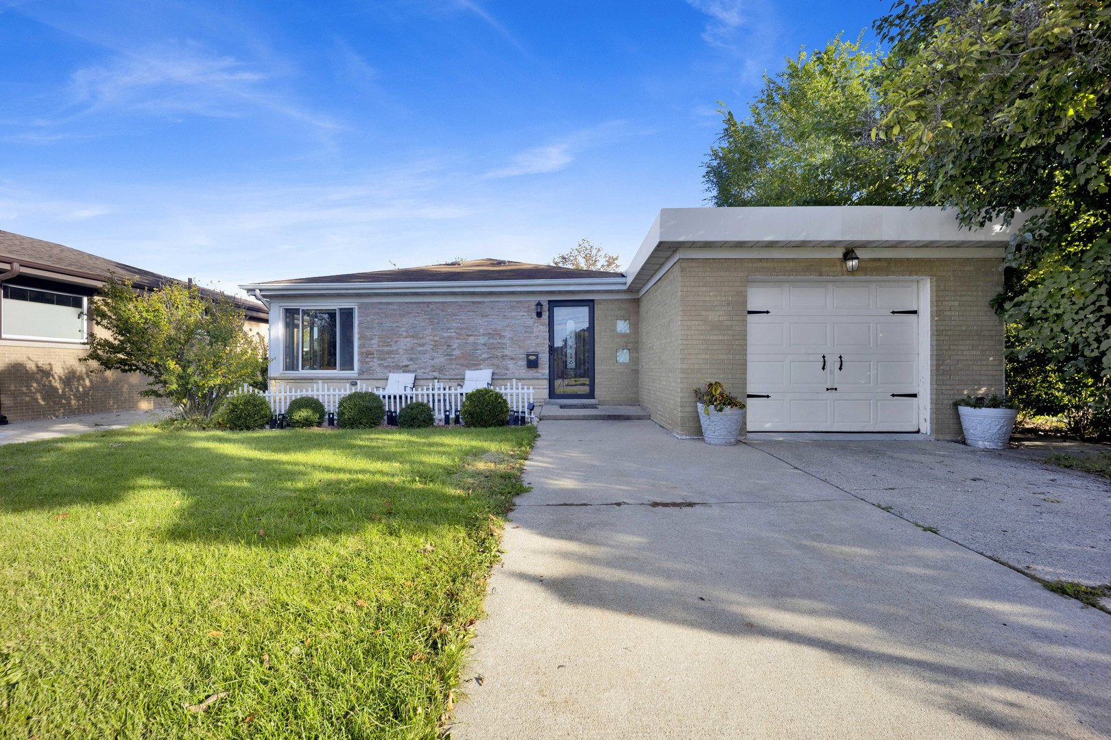 Charming brick and stone ranch offering the perfect blend of classic character, modern updates, and versatile living space! Featuring 3 bedrooms and 1 full bathroom on the main level, plus a one-car garage, this inviting home welcomes you with refinished hardwood floors throughout, a spacious, sun-filled living room, and a formal dining room with skylights. The beautifully updated kitchen boasts abundant cabinetry, granite countertops, ceramic tile flooring, and a skylight. All three bedrooms offer generous closet space, while the stylish, modern bathroom completes the main level. The full, finished basement provides exceptional additional living space, featuring a family room, home office, guest bedroom, second full bathroom, laundry room, utility room, and multiple storage rooms and closets. Enjoy the large backyard with patio, perfect for relaxing, grilling, and entertaining. Ideally located near the train for an easy commute, with convenient access to I-294 and I-90. Situated within highly rated Park Ridge schools, this home offers comfort, space, and convenience in a fantastic location!