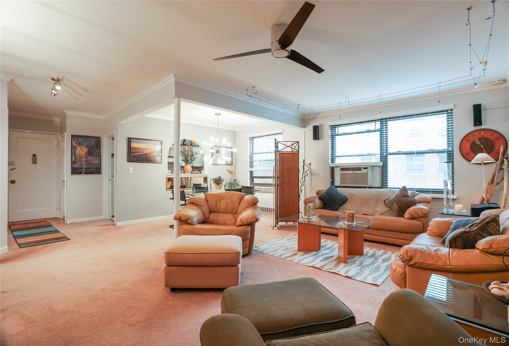 Pristine two bedroom unit, centrally located in a very well kept ,peaceful garden style building , steps from all shops, restaurants, train station and near public transportation.Second/top floor unit features,bright,natural lighting, crown mouldings, excellent closet space, two bathrooms, dishwasher, all beautiful light fixtures and A/C.Heat and hot water are included in the maintenace charges.Parking spaces and storage are  available with  extra charges per month.Residents can enjoy large outdoor swimming,pool and bbq area.Cat is welcome!
