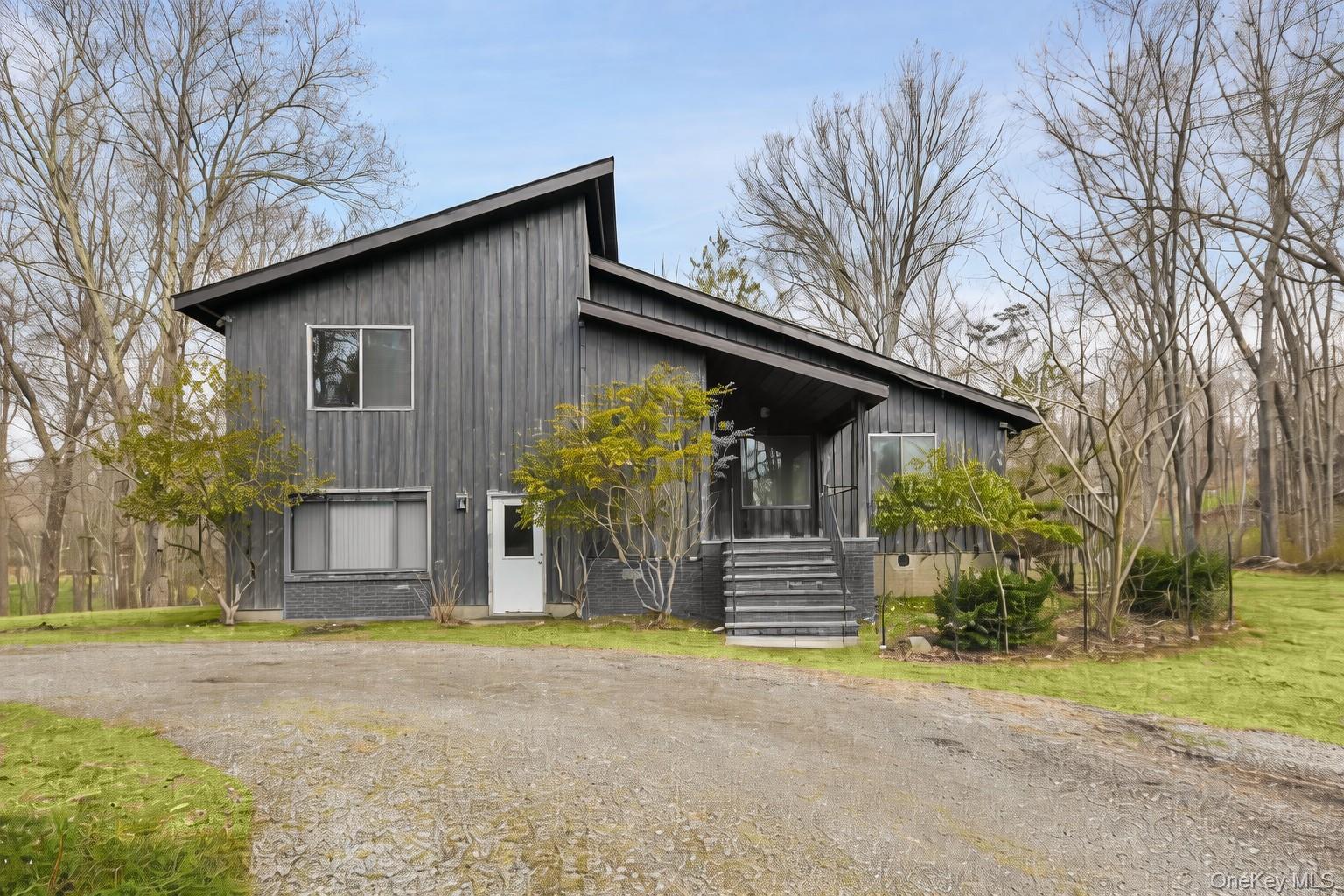 Bright & Airy Contemporary with Soaring Cathedral Ceilings! Welcome to your private retreat in the charming town of Pound Ridge. Set on 2.6 serene acres, this 3-bedroom, 3-bathroom home offers a rare opportunity to create your dream oasis in one of Westchester’s most sought-after locations. At the end of a long, private driveway, this home is surrounded by natural beauty, sounds of nature, complete with a gorgeous pond to enhance the already tranquil setting. Whether you’re seeking a full-time residence, a weekend escape from the city, or an investment opportunity, this hidden gem presents endless potential. Run, don't walk, it will not last!