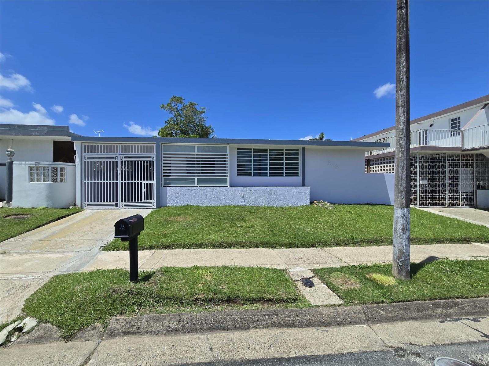 UNIQUE OPPORTUNITY IN EXTENSIÓN PARKVILLE! YOUR HIDDEN PARADISE IN Guaynabo / San Juan.  READY TO MOVE!!!This is not just a property… it’s the kind of place that when you see it, you instantly know it’s the one. Located in one of the most central and connected areas of Guaynabo/San Juan, in Extension Parkville, this residence combines location, privacy, comfort, and immediate investment potential.Situated just minutes from major highways such as PR-22 and PR-52, this property offers fast access to the most important points of the metropolitan area, including preschools, the CPS Parkville School, the "Centro Comprensivo de Cancer UPR", Medical Center, Hato Rey financial district, Interamericana University, the University of Puerto Rico, Río Piedras campus. You are also close to Plaza Las Américas, top restaurants, and shopping centers. Additionally, it is approximately 17 minutes from Luis Muñoz Marín International Airport under normal traffic conditions. For leisure, you are only a short drive from beautiful beaches such as Condado, Isla Verde, and Ocean Park, allowing you to enjoy both city convenience and coastal living. Despite its central location, the community maintains a peaceful residential atmosphere, offering the perfect balance between urban accessibility and private comfort.The property features 4 spacious bedrooms and 2 fully remodeled bathrooms, move-in ready and designed for comfort. Its layout is ideal for large families or for those seeking space for remote work or additional income opportunities.It includes a 2-car carport with storage area, adding practicality and extra functionality for daily living.The spacious, fully fenced backyard is a true private oasis—perfect for gardening, entertaining, building outdoor living spaces, or simply relaxing and enjoying your own organic coconut water. Enjoy coconuts from your own yard.Community amenities that elevate your lifestyle:* Basketball courts* Soccer field* Playground* Passive park with relaxing green areas* 24/7 security* Schools from daycare and up, all nearbyHere you are not just buying a home… you are investing in a lifestyle that offers comfort, convenience, privacy, and long-term value appreciation.This is a rare opportunity in a high-demand area and it will NOT last long on the market.Schedule your private showing TODAY and secure this hidden gem before it’s gone.