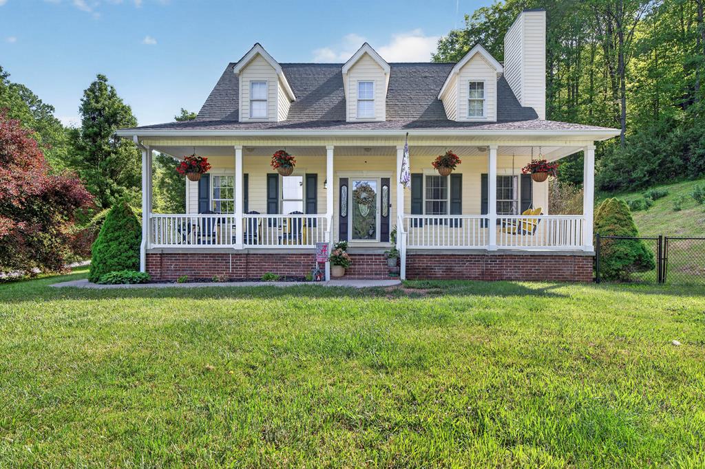 New Price! Nestled in the scenic mountains of Southwest Virginia, this stunning retreat offers the perfect blend of privacy, comfort, and natural beauty. Situated on approximately 54.94 acres, 520 Mountain Lake Drive features 4 bedrooms, 2.5 baths, and over 2,400 square feet of living space designed for both relaxing and entertaining.    Step inside to find warm hardwood flooring, spacious living areas, and a cozy fireplace that creates the perfect mountain-lodge feel. Both the attached and detached garages offer generous storage space for vehicles, hobbies, or outdoor equipment.    Outside, enjoy peaceful mountain views, open acreage, and the tranquility that only Tazewell County can offer. Whether you're looking for a private full-time residence, weekend getaway, mini farm, or recreational property, this home delivers endless possibilities with room to roam and enjoy the outdoors year-round. Nearby recreational amenities include the Pocahontas Trail, The Back of the Dragon and various other ATV trails.  Conveniently located just minutes from town while still offering seclusion and serenity, this is mountain living at its finest.