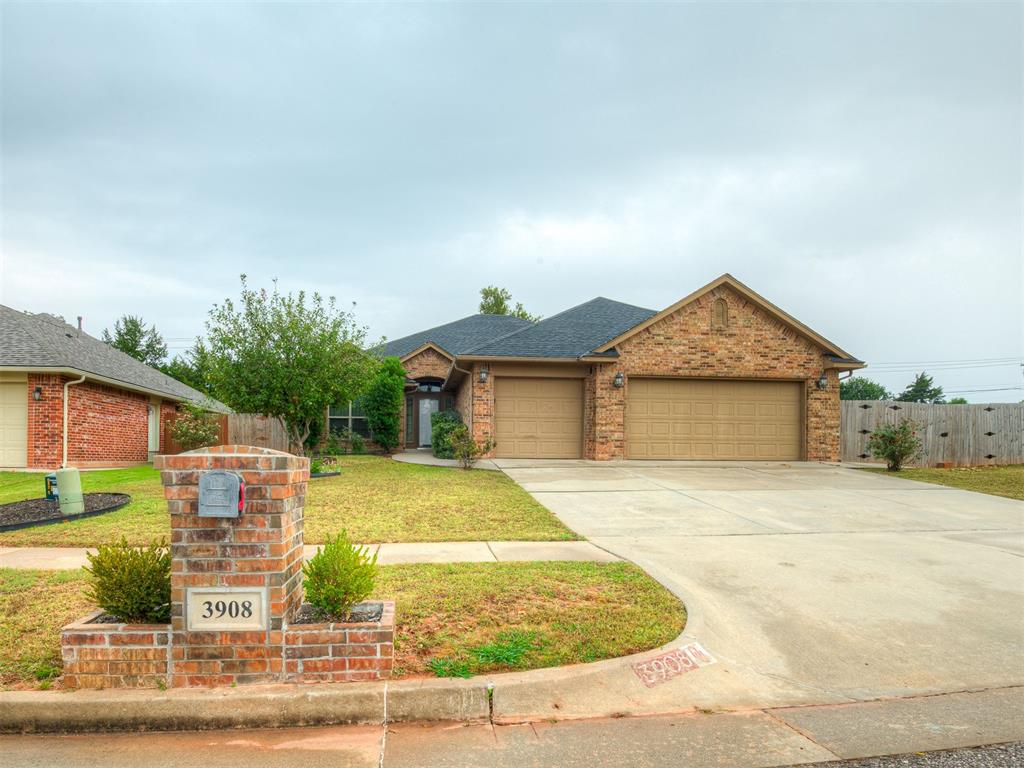 Step up to this stunning corner-lot home along a charming walkway lined with rose bushes and a fresh fruit tree to welcome you home. Inside, tall ceilings and large windows fill the space with beautiful natural light, highlighting the open-concept design and thoughtful details throughout.

The entry opens into a spacious living room featuring a stone fireplace and plenty of room to gather. The kitchen offers granite countertops, updated finishes, a large pantry, abundant storage, and extra bar seating that flows seamlessly into the dining area — perfect for entertaining.

Just off the main living space, you’ll find a private office with elegant wood double doors and built-in shelving. Two additional bedrooms are tucked away nearby, while the oversized primary suite sits on its own side of the home for privacy. The primary retreat includes a relaxing soaking tub, walk-in shower, dual sinks, and an enormous closet that’s sure to impress.

The laundry room is complete with a full-size washer and dryer area, its own closet, and even more storage throughout. The extra-large three-car garage includes a storm shelter for peace of mind.

Step outside to enjoy a huge backyard with a new fence, large patio, and plenty of room to play, garden, or entertain.

Conveniently located near highways, shopping, dining, and within the Moore School District, this home truly offers it all — inside and out. Welcome Home!