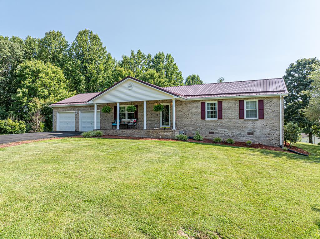 One level easy maintenance brick ranch located at the end of a quiet cul-de-sac street.  Three bedrooms, 2 full baths.  Spacious eat in kitchen.  Living room with gas fireplace. ( Propane tank has been removed) The sun room was damaged in a storm and was completely replaced in 2024. Sun Room is heated and cooled by a mini split system. Two car garage. Covered front porch. Above ground pool. Expansive - private- back deck overlooking the large back yard.  Perfect for entertaining.  Per the owners heat pump was replaced in approx 2011.  Roof, decking and pool are approx 15 years old. Internet provider is Point Broadband. There is an underground dog fence already in place. All appliances including washer, dryer will convey with the sale. Please see electricity costs, foundation receipts, septic docs and restrictions in MLS docs.