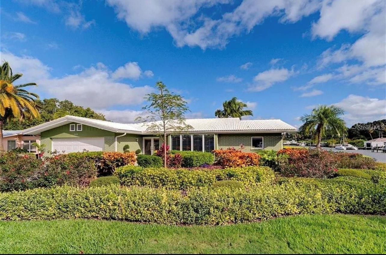 Owner Financing! Welcome to this stunning 3-bedroom, 3-bathroom home located in the highly desirable Harbor Bluffs community of Largo. This move-in ready property is a rare find, offering luxurious upgrades, abundant natural light, and the perfect blend of comfort and coastal living. Panoramic water views, and the true Florida lifestyle. Step inside to enjoy brand new tile flooring throughout and a freshly painted interior, creating a bright, modern, and inviting atmosphere. Complemented by classic plantation shutters that add timeless elegance and privacy. The spacious layout includes two comfortable living areas, perfect for entertaining or relaxing with family and friends. Outside, your private oasis awaits: a sparkling swimming pool, gorgeous waterfront views, and a brand new dock (built in 2024) — ideal for your boat or jet ski, with direct access to the Intracoastal. Whether you're into boating, fishing, or just soaking up the sunsets, this backyard delivers it all. Additional features include a 2-car garage and a prime location in one of Largo’s most beautiful neighborhoods. Close to beaches, restaurants, shopping, and top-rated schools, this home combines luxury, convenience, and lifestyle. Don’t miss this rare opportunity to own a beautifully updated waterfront home with a pool in Harbor Bluffs. Schedule your private showing today!