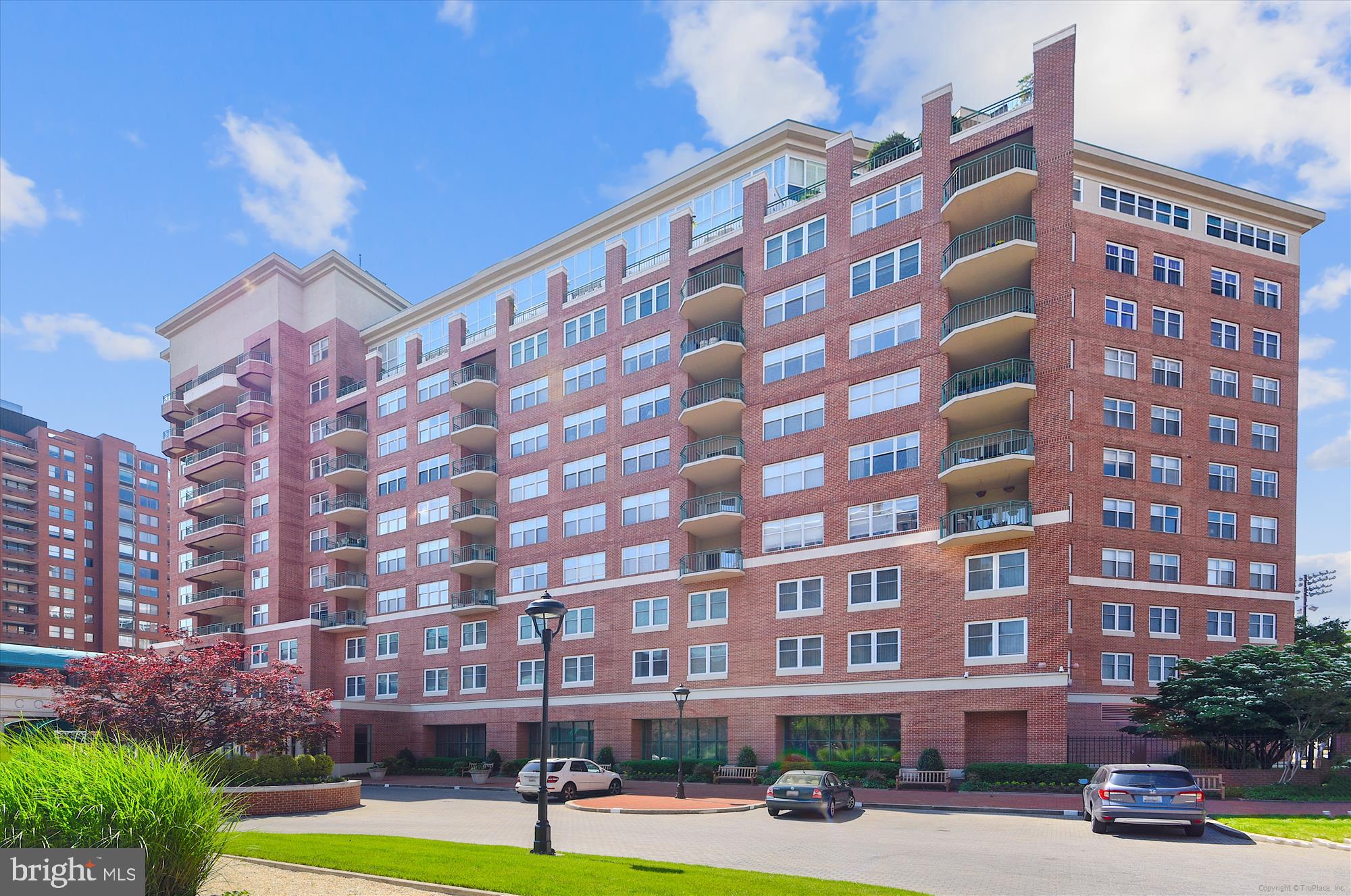 This exquisite residential unit, located within the prestigious Residences at the Colonnade directly across from Johns Hopkins University, Homewood Field, offers an unparalleled living experience characterized by luxury and sophistication. Originally constructed in 1990 and extensively renovated in 2007, this contemporary high-rise condominium spans 1,494 square feet and is in excellent condition, showcasing high-end finishes and thoughtful design throughout. Upon entering, one is greeted by an elegant foyer that leads to a spacious living area adorned with engineered wood and marble flooring, complemented by crown moldings and recessed lighting that enhance the ambiance. The formal dining room provides an ideal setting for entertaining, while the breakfast area and eat-in kitchen offer casual dining options. The kitchen is a culinary enthusiast's dream, featuring upgraded countertops, stainless steel appliances-including a built-in microwave, range, refrigerator/freezer and dishwasher-and ample table space for gatherings. The unit comprises two generously sized bedrooms, each designed with comfort and privacy in mind. The primary suite boasts a luxurious en-suite bathroom equipped with a walk-in shower, providing a serene retreat. Additional features include walk-in closets and a well-appointed second bathroom, ensuring convenience for residents and guests alike. This property is equipped with modern conveniences, including in-unit laundry facilities and a comprehensive security system featuring 24-hour monitoring, 24-hour doorman services, 24-hour front desk, and surveillance systems, ensuring peace of mind for residents. The building itself offers an array of amenities, including concierge services, an exercise room, extra storage, and two reserved parking spaces in a secure garage, enhancing the overall lifestyle experience. The exterior of the building is equally impressive, featuring brick construction, underground lawn sprinklers, well-maintained common grounds, and newly renovated lobby. Residents can enjoy the benefits of a meticulously managed community, with services such as snow removal, trash collection, and lawn maintenance included in the association fee. Strategically located within proximity to public transportation options, this residence provides easy access to urban conveniences while maintaining a tranquil atmosphere. The combination of luxury features, exclusive amenities, and a prime location makes this property a remarkable opportunity for discerning buyers seeking a refined lifestyle.
