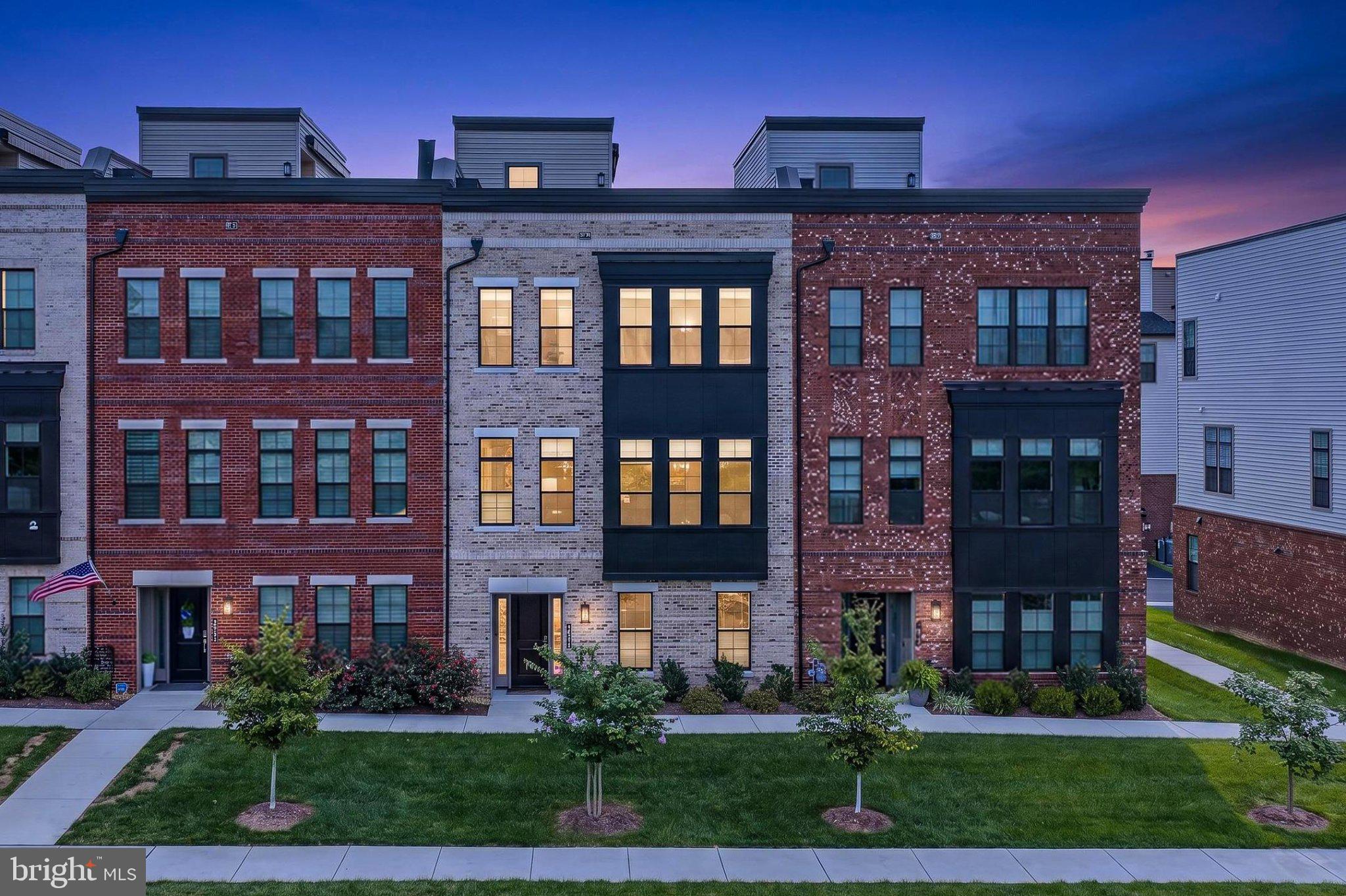 Welcome to the beautifully appointed Dylan Woodbury model by Toll Brothers, located in Regency at Belmont, Ashburn’s sought-after 55+ active-adult community. Designed for sophisticated, low-maintenance living, this exceptional elevator townhome combines timeless luxury with thoughtful owner enhancements. A private elevator serves every level—including the garage—while the expansive rooftop terrace creates an impressive setting for relaxing and entertaining.Inside, upgraded 7.5-inch-wide engineered hardwood flooring extends throughout the home, with carpeting thoughtfully added to the staircases for comfort. Ceiling fans with dimmable lighting have been installed in every bedroom, along with a ceiling fan in the living room, while window treatments throughout the home provide added style and privacy.The gourmet kitchen is a true showpiece, featuring soft-close white perimeter cabinetry extending to the 10-foot ceiling, an expanded center island, a recently replaced refrigerator, and stunning Bianco Calacatta quartz countertops and backsplash. The renovated pantry closet provides enhanced storage and organization, making the kitchen as functional as it is beautiful.The flexible fourth bedroom can easily serve as a home office, den, hobby room, fitness space, or comfortable guest suite. Additional thoughtful improvements include custom shelving in the laundry area, a finished storage closet beneath the stairs, and a foyer door that provides added privacy and flexibility.The spacious primary suite has been further enhanced with a beautifully renovated walk-in closet. The primary bathroom features a soaking tub with a custom tile surround, along with a retiled shower floor that complements the upgraded finishes. The third-floor bathroom has also been improved with a sleek glass-door shower enclosure. A conveniently installed doggie door makes the home especially welcoming for four-legged family members.One of the home’s most extraordinary features is the expanded rooftop terrace. Approximately $30,000 was invested in Toll Brothers terrace decking and artificial grass, creating a polished and inviting outdoor retreat. Complete with a retractable awning and gas line, this impressive space is ideal for outdoor dining, entertaining guests, or simply unwinding at the end of the day.Regency at Belmont offers an active and welcoming lifestyle with neighborhood gatherings, clubs, walking trails, and inviting community spaces. A social membership to Belmont Country Club provides access to resort-style amenities, including the outdoor pool, clubhouse, dining, tennis, pickleball, and more. Additional fitness and golf membership options are also available.Ideally located just steps from Belmont Chase, residents can enjoy convenient access to Whole Foods, CAVA, Cooper’s Hawk Winery & Restaurant, and numerous shopping and dining destinations. The community is also conveniently located near Route 7, Route 28, One Loudoun, INOVA Loudoun Hospital, Dulles International Airport, and the Metro.Beautifully designed, extensively enhanced, and completely move-in ready, this remarkable Dylan Woodbury model delivers luxury, convenience, and an exceptional active-adult lifestyle in one of Ashburn’s most desirable communities. The lifestyle you’ve been waiting for is here—welcome home to 19818 Bodmer Drive.
