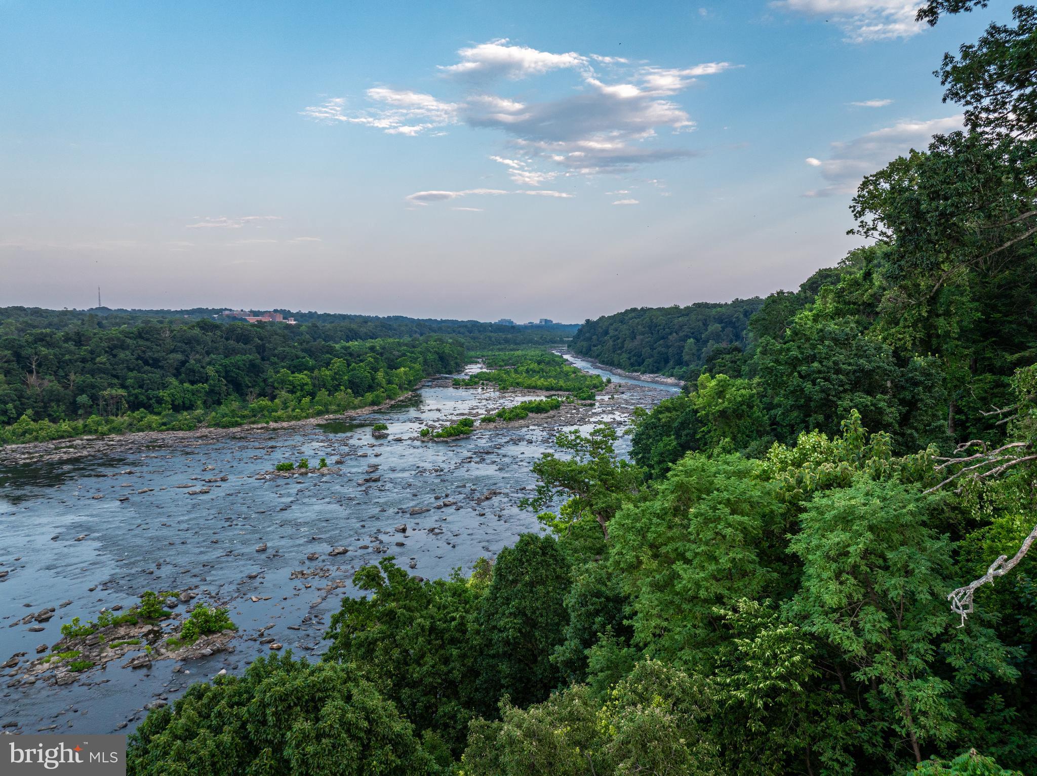 Experience direct riverfront living at its finest with this exceptional estate opportunity, boasting a prime location on one of Washington's most prestigious streets and offering breathtaking views of the Potomac River and the dramatic waterfall which traverses the river.  Encompassing nearly two and a half acres which runs directly to the water's edge, this unique estate is introduced by a gently winding drive leading to an existing nearly 6,000 sq. ft. residence. The estate presents an unparalleled opportunity to customize or build a new riverfront estate.The current residence includes four spacious bedrooms and five full baths, including the expansive main level primary suite.  The innovative design was designed to maximize the expansive river views with floor-to-ceiling windows across the entire main and upper level. Four fireplaces and a richly paneled library set the stage for a home which easily accommodates both large scale entertaining and a deep connection to the exceptional natural environment.  The existing home's unique design is particularly evident on the expansive outdoor terrace, which reveals unobstructed, 180 degree views of the Potomac River.Located less than ten minutes from both Washington, DC and Tysons Corner, Virginia, this estate's location is second to none. Surrounded by many of the region's most exclusive properties, 1159 Crest Lane offers a rare opportunity to create a riverfront estate of uncompromising luxury.