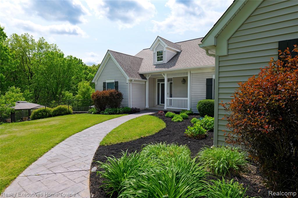 THIS IS YOUR ONE CHANCE! OPPORTUNITY IS KNOCKING!  Don't miss out on this Dream Home situated perfectly on an amazing piece of property! Make your way down French Lane.  At the end of the private road, turn left into this 11 ACRE ESTATE. You've arrived at your family resort!  As you enter, you will come to a fork in the driveway. Veer right, head down to the huge 30 x 50 pole barn with a large door at each end of the structure. Veer left and make your way to this gorgeous country home on the hill. The three bedroom home with an option for a forth in the lower level with walkout will make you feel as if you have finally arrived home! Starting on the lower level, notice a huge family room and storage area that is approximately 800 square feet.  There is also a large bathroom with a sauna., Open up the door wall to the private resort like pool with hot tub and two gazebos. Making your way to the main level, there is a large family room overlooking the estate like property. Watch the deer frolicking at the bottom of the hill. That happens several times a day! There is a kitchen with gorgeous custom cabinets, master bedroom and master bath, as well as a second bedroom. Don’t forget about a cozy setting in front of the fireplace! No matter where you are in the home, look out and see nature at its finest. Entertaining family and friends will be so much fun. Oh, as you entertain, don’t worry about losing power because you now have a whole house generator. You will never be out of power again! Upstairs, there is a nice size third bedroom with walk-in closet. Even though you will feel like you’re in the country, the home is actually located minutes away from I-75, M-59, Historic Holly, Schools, and shopping. Enjoy all four seasons!  Spring with everything in bloom including the fruit trees and garden, summer by the pool and riding the trails through the woods,  Hunt on the property in the fall, and sledding in the winter! 
Write your offer today! SEE, DREAMS DO COME TRUE!