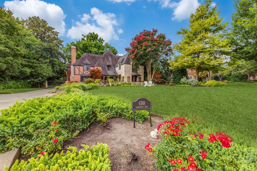 Welcome to the estate block of Lakewood Blvd. This wonderfully updated and expanded 1935 award-winning property, sits on .55 acres of prime Lakewood real estate. With 7,026 square feet in the main house and 888 square feet in the guest house, this home is one of Lakewood’s classic beauties.
The home features include: Ludowici tile roof, arched doorways, high ceilings, hardwoods, three fireplaces, multiple living areas, study, sunroom, stone fireplaces, oversized laundry room with laundry shoot, mudroom, two staircases and large breakfast room. The chef’s kitchen features Sub-Zero appliances, double ovens, commercial-grade range, two dishwashers, multiple refrigerated drawers, marble counters, large center island, butler’s pantry with ice maker and beverage fridge. 
Upstairs, the primary suite offers vaulted ceilings, fireplace, balcony, 2 walk-in closets and cedar closet, spa-like bath and connecting office. Three large secondary bedrooms include en-suite and shared baths, plus sitting room and bonus storage. A third-floor finished attic adds a flexible space.
The grounds of this home have lush landscaping, fully turfed backyard, attached  two-car carport, full house generator, automatic front gate and two-car garage with second floor guest house. The detached guest house features a kitchen, living area, bedroom, and full bath, as well as walk-in closet
This property has been lovingly updated by the last three owners, with designer wallpaper, gorgeous lighting, custom drapes, freshly painted walls and much, much more. This property needs to be seen to be appreciated.