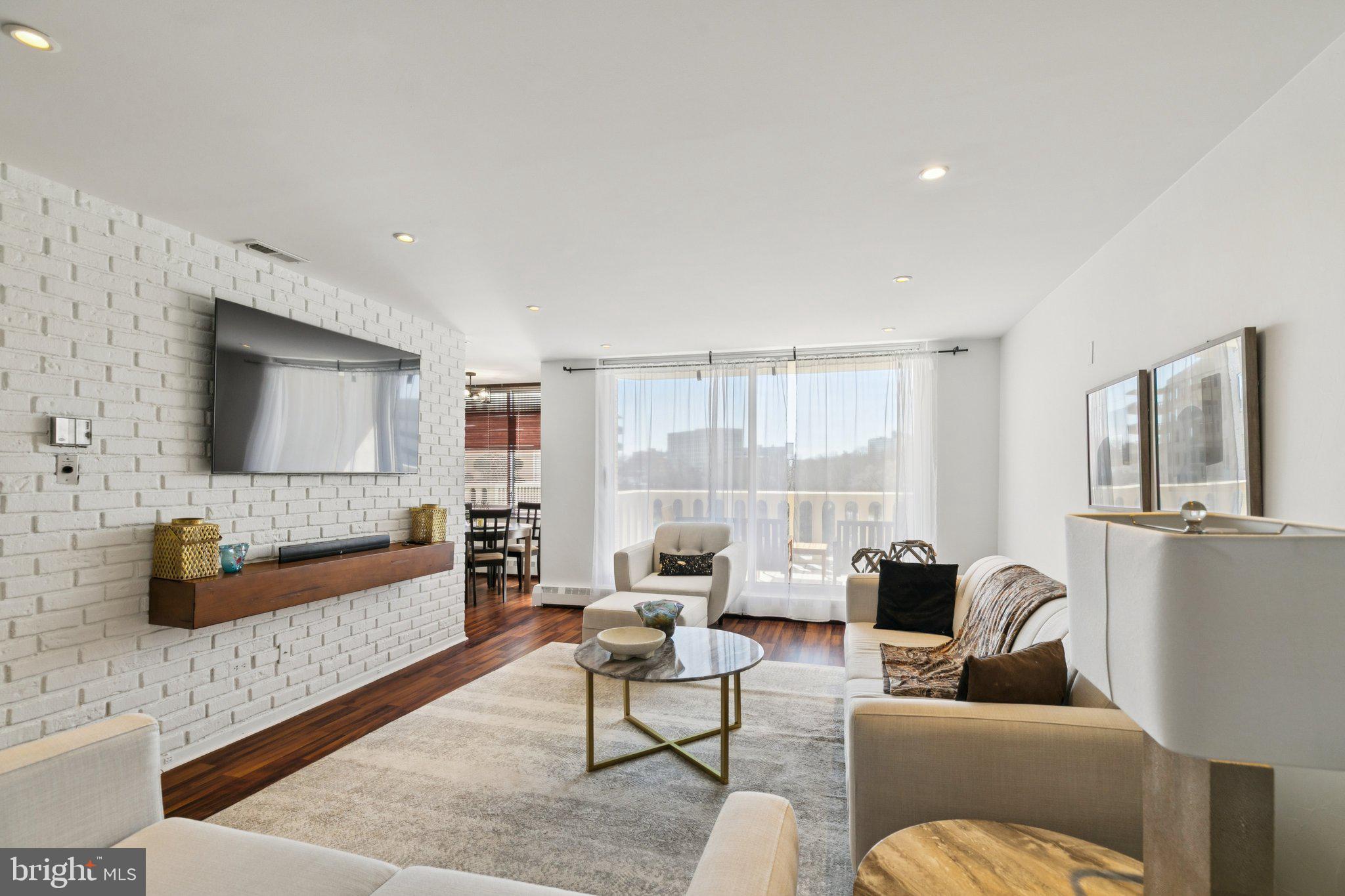 Move right into this beautifully updated 1-bedroom, 1-bath residence offering 910 square feet of comfortable living space at 191 Presidential. The spacious, open-concept living area showcases brand-new flooring, a striking exposed brick accent wall, and sliding doors that lead to a private balcony—perfect for enjoying fresh air and morning coffee. The renovated kitchen is both stylish and functional, featuring sleek cabinetry, granite countertops, stainless steel appliances, and abundant storage, all flowing seamlessly into a bright dining area. The generously sized bedroom includes a walk-in closet, while the updated full bathroom is finished with a double vanity for added convenience. Residents of 191 Presidential enjoy a premier, full-service lifestyle with a doorman, concierge, 24-hour security and maintenance, valet service, and on-site porters. The monthly condo fee covers utilities, building maintenance, and access to exceptional amenities including an Olympic-sized pool, tennis courts, and a fully equipped fitness center. Located within the award-winning Lower Merion School District and just minutes from Center City, Manayunk, and major highways, this community offers both convenience and ease of living.
