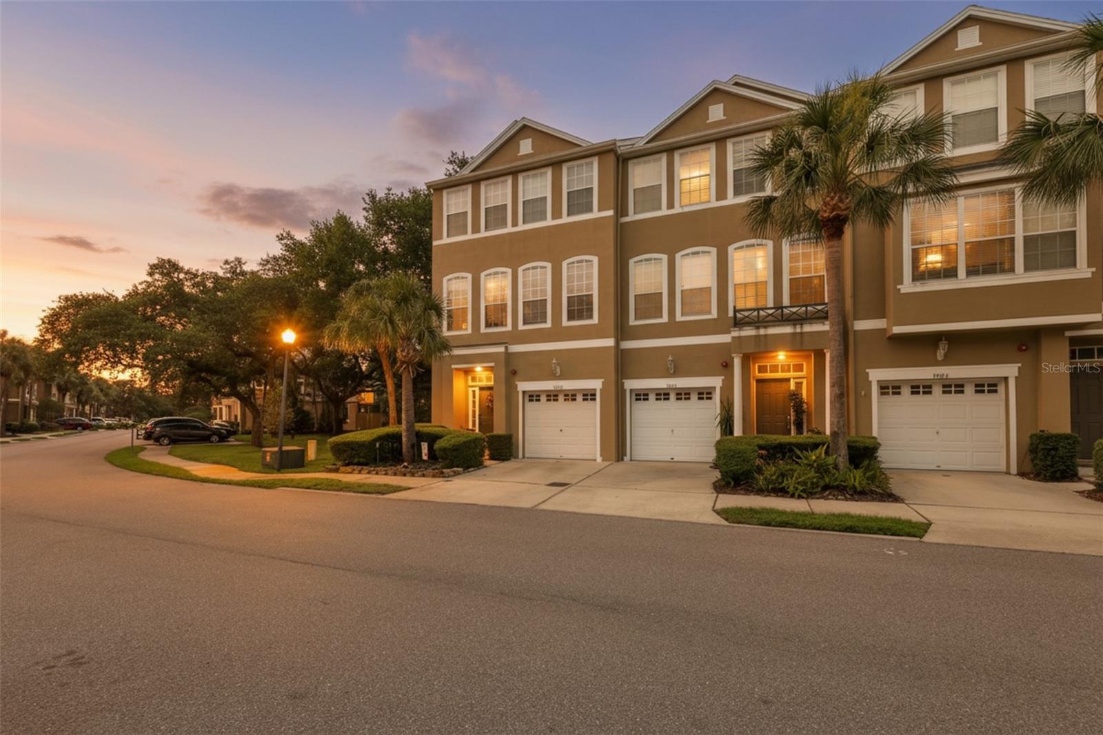 Rare End-Unit Townhome with Pond Views in Gated South Tampa Community! Welcome to Bayshore Pointe, one of South Tampa's most desirable gated communities, offering resort-style amenities and an unbeatable location just minutes from Bayshore Blvd, Downtown Tampa, Water Street, and MacDill Air Force Base. This beautifully maintained end-unit townhome features 3 bedrooms, 2.5 baths, a one-car garage, and serene pond views from multiple outdoor living spaces. Step inside to the first floor where a spacious family room with tile flooring creates the perfect flex space for entertaining, a media room, home office, or gym. A convenient half bath, laundry closet, under-stair storage, and access to the private patio overlooking the pond make this level both functional and inviting. Upstairs, engineered hardwood flooring flows throughout the main living area. The open-concept second floor features a spacious living room, dining area, and a well-appointed kitchen complete with granite countertops, stainless steel appliances, natural gas cooking, a pantry, and abundant cabinet space. French doors open to a private balcony where you can enjoy your morning coffee while taking in peaceful views of the pond and mature pine trees and oak trees. The third floor offers a carpet-free retreat with luxury vinyl flooring throughout and soaring vaulted ceilings that enhance the sense of space and light. The primary suite features a walk-in closet with built-in organization, a soaking tub, and a separate shower. Two additional guest bedrooms share a full bath, while an oversized hallway linen closet provides valuable storage space. Additional improvements include a new HVAC system installed in 2022, offering peace of mind for years to come. Located just steps from the community pool and tennis courts, this home also enjoys convenient guest parking directly across the street. Bayshore Pointe residents enjoy gated entry, beautifully maintained grounds, a private fishing pier, and easy access to Tampa's best destinations, including Bayshore Boulevard, Hyde Park, Water Street, Downtown Tampa, Tampa International Airport, International Plaza, and MacDill Air Force Base. Whether you're searching for a primary residence, second home, or low-maintenance South Tampa lifestyle, this exceptional end-unit townhome delivers the space, views, and location you've been waiting for.