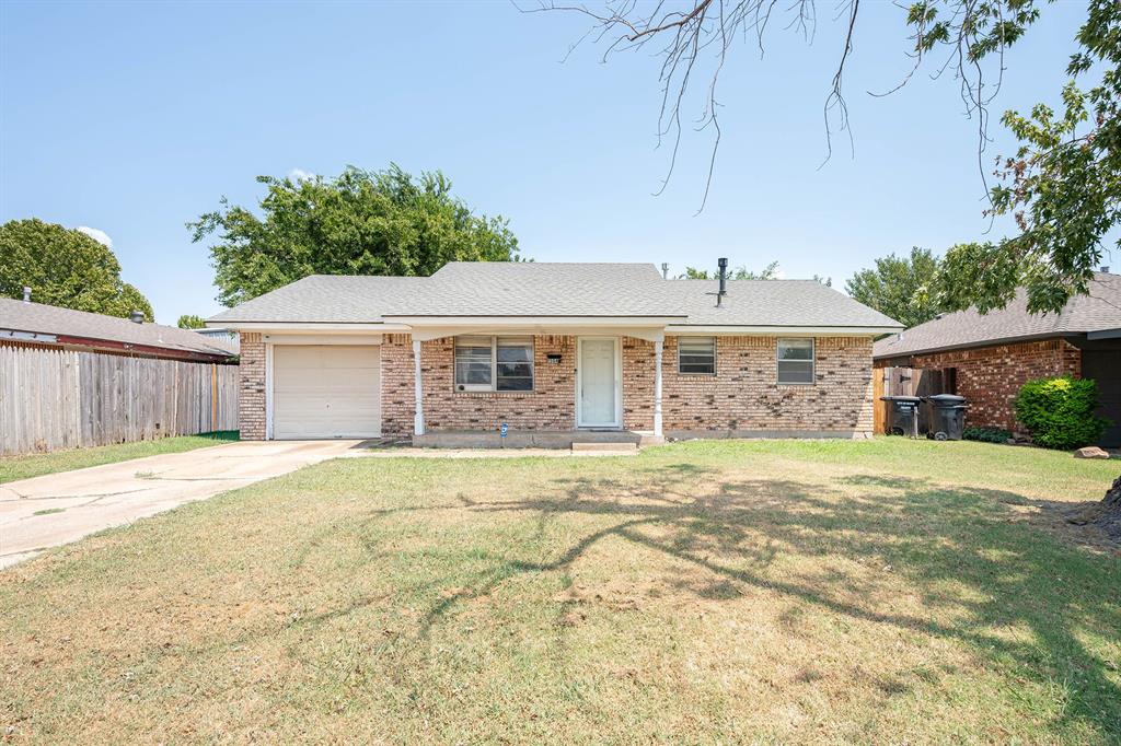 Located in the heart of Moore, this 3-bedroom, 1-bath home features natural wood-tone cabinetry and tile flooring in the kitchen. The covered front porch provides a welcoming entry, while the backyard offers a good-sized outdoor space. Conveniently located less than a mile from Parmele Park, dining options, and access to I-35.