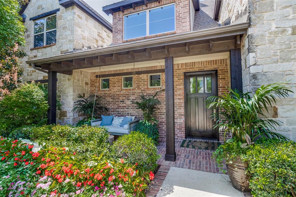 OPEN SUNDAY 2-4 P.M. This incredible home is PRICED BELOW TAX VALUE! The open kitchen with large island, breakfast area and den all overlook the covered patio, pool & spa, turf & lush landscaping.  Boasting a chef's kitchen with 48 inch gas cooktop, stainless appliances, walk-in pantry, mudroom and a water osmosis system at the sink. The spacious PRIMARY SUITE IS DOWN with pool views. The spa like bathroom has separate vanities, a water closet, soaking tub and more.  There is also a formal dining room and a private study, ideal for remote work or another living area. Upstairs you find a thoughtful layout with the guest room & ensuite bath, a mini bar area and a huge game room.  Down the opposite hall there are two large bedrooms with a JJ bath, each with their own sink and dressing area.  There is a second laundry up. This home has exceptional storage throughout with elfa shelving in the mudroom, laundry down and garage. A covered walkway leads to the oversized two car garage,  all behind the electric gate. White Rock lake, schools, shopping and restaurants all close by.