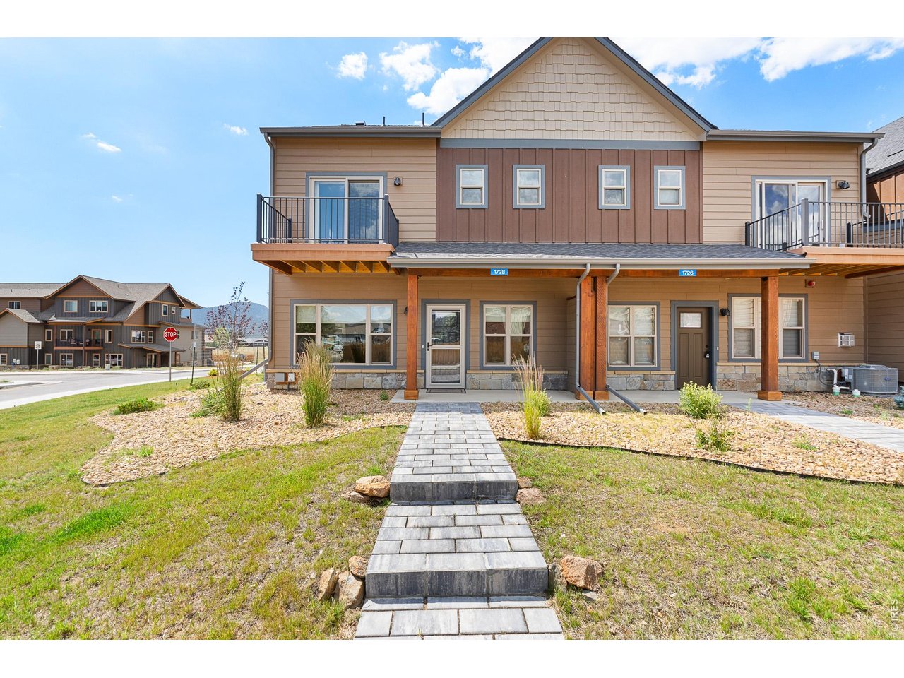1728 Continental Peaks Circle, where mountain living meets everyday comfort in one of Estes Park's most desirable settings.Surrounded by breathtaking natural beauty & just mins from downtown Estes Park &Rocky Mountain NationalPark, this beautifully maintained one-of-a-kind end-unit townhome offers the perfect blend of privacy,convenience, & Colorado charm.Filled w/natural light, the thoughtfully designed floor plan creates warm, inviting spaces ideal for relaxing & entertaining.Spacious living room showcases picturesque mountain views, while the well-appointed kitchen features generous counter space, granite counters & seamless flow into the dining area.Throughout the home, you'll appreciate quality upgrades, including Hunter Douglas blinds, upgraded ceilingfans, premium light fixtures, solid-core doors, upgraded electrical switches, & stair lighting.Primary suite offers a peaceful retreat w/ an upgraded dual-rod closet system, additional bedrooms provide flexibility for guests,home office, or hobbies.Everyday convenience continues w/ added shelving & a drying rod in the laundryroom, custom coat closet at the garage entryway, upgraded storm door w/ a builtin screen, & heated garage for year-round comfort & convenience.Outside, enjoy the beauty of the surrounding mountains,mature trees, & abundant wildlife from your private outdoor living space-the perfect setting for morning coffee or evening sunsets. A whole-house fire sprinkler system provides added peace of mind, while the HOA maintains the exterior, landscaping, & snow removal, allowing for a truly low-maintenance lifestyle.Whether you're searching for a full-time residence, mountain retreat, or investment opportunity, this exceptional home offers outstanding versatility in an unbeatable location w/ access to hiking, biking, fishing, golf, shopping, dining, &year-round recreation. Don't miss this rare opportunity to own beautifully upgraded mountainhome where spectacular scenery &carefree living come together.