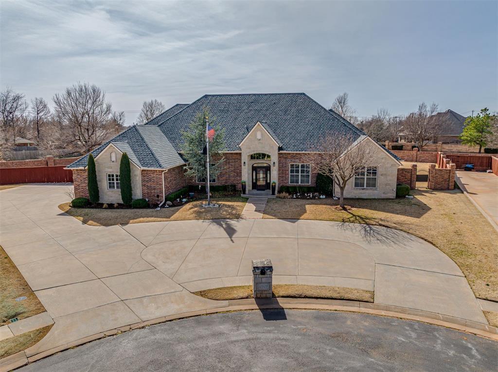 Behind a private gated entry in one of Northwest OKC’s most sought-after neighborhoods, this one-of-a-kind custom estate was designed with intention, accessibility, and unforgettable entertaining in mind.Every detail imagined. Every upgrade included. For added peace of mind, the home features a brand new impact-resistant roof, offering durability, potential insurance benefits, and long-term protection.Inside, you’ll find built-ins galore, deep closets, and thoughtful storage throughout. The chef’s kitchen is a true showpiece featuring double ovens, an appliance garage, a butler’s pantry, Culligan water system, and an entertainer’s layout that flows effortlessly for hosting. This home was created for gathering.Upstairs, the bonus room offers a private bar with sink, mini fridge, and full bathroom, making it the perfect media lounge, guest retreat, or game-day headquarters. Two secondary bedrooms share a Jack-and-Jill bath, while the primary suite delivers luxury with a dedicated vanity space and spa-inspired feel.Practical luxury shines throughout the home, including an indoor safe room, ADA features, an attic storage lift, a discreet closet for hidden TV wiring, a present-wrapping station in the laundry room, a French drain system, and meticulous maintenance that reflects pride of ownership.Step outside to your private oasis featuring a pool and spa, complete with a retractable cover at the touch of a button. With surround sound carrying your favorite playlist into the evening air and gated PikePass-accessible entry for convenience, every detail supports comfort and ease.To make the transition effortless, the sellers have compiled a detailed list of trusted vendors they’ve used over the years, allowing the next owner to step in and live with confidence from day one.This is not just custom. This is curated. Designed for entertaining. Built for comfort. Maintained with intention.