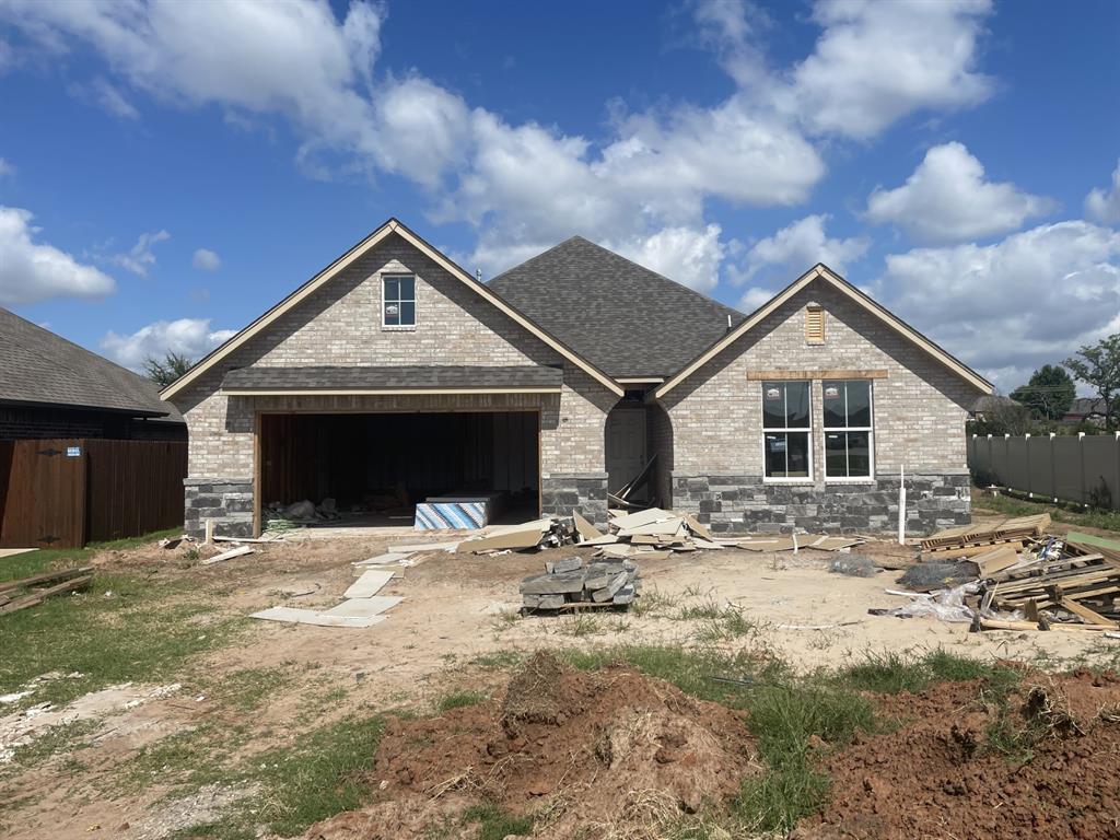 This gorgeous new home features 3 beds, 2.5 baths & 3-car garage (2 car front w/ tandem). The open kitchen overlooks a large living space and boasts a furniture-style w/ pendant light above and massive walk-in pantry. Designated mud zone w/ custom bench. Laundry has ample storage w/ cabinets & linen closet and connects to master closet. Master suite has double vanities, linen storage and walk-in shower. Tons of storage options throughout! This home is the perfect mix of warm modern design w/ all finishes chosen by Studio Tatum Home Design. Smart-home ready w/ the Honeywell alarm module. Full Sprinkler system, 1 year Builder Warranty & 10 year structural warranty by QBW