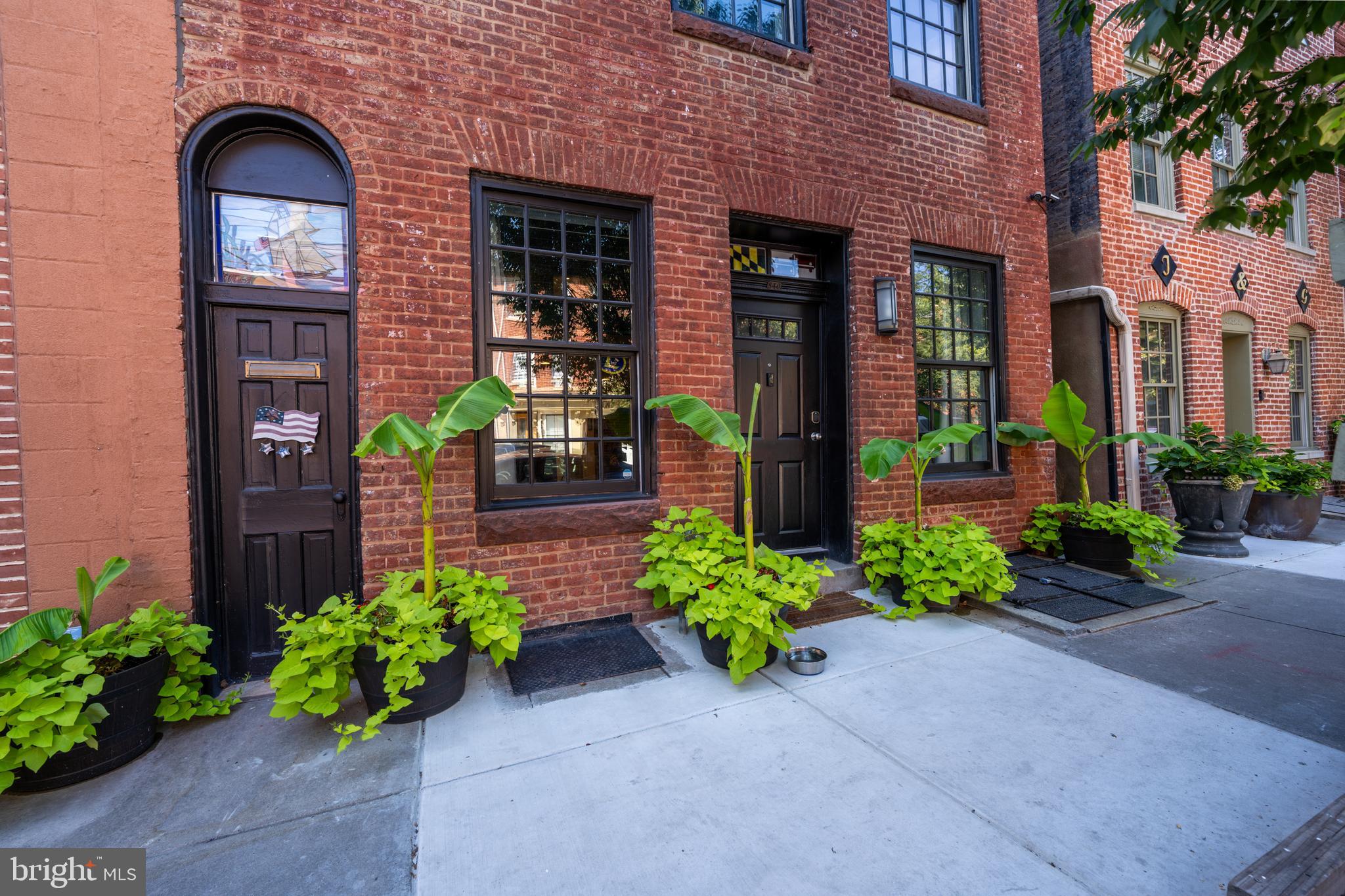 Extraordinary Space, Unbeatable Location – The Best of Fells Point LivingWelcome to 840 S Bond Street—where historic charm meets modern scale in the heart of Fells Point. Tucked just a half-block from the waterfront and steps from the best of Baltimore’s beloved waterfront neighborhood, this expansive four-level residence offers an impressive footprint rarely found in city living. Offered fully furnished, this home is move-in ready and ideal for tenants seeking a smooth and stylish transition. Whether you’re relocating, or downsizing from the suburbs, 840 S Bond Street delivers the ultimate turnkey experience.Inside, you'll find over 4,100 square feet of thoughtfully designed living space across four floors, including a full lower-level billiards room, multiple gathering areas, and four spacious bedrooms. The main level wows with soaring ceilings, an open-concept kitchen anchored by an oversized island, and sun-filled living and dining areas that flow seamlessly for entertaining. Upstairs, the luxurious primary suite spans the width of the home with a spa-inspired bath and custom walk-in closet. Additional bedrooms and baths provide comfort and flexibility for guests, family, or a home office.What truly sets this home apart is its secure off-street parking—a rarity in Fells Point. Enjoy the convenience of a private garage and gated parking pad, all tucked behind a fenced courtyard for added peace of mind.Step outside and you're just moments from everything that makes this neighborhood special: Belgium block streets, award-winning restaurants, cozy cafes, boutique shops, and vibrant nightlife. The waterfront promenade is less than a block away, perfect for morning jogs or sunset strolls. Whole Foods, Harbor East, and Canton are all just minutes away—placing you at the center of Baltimore’s most desirable lifestyle.If you’re seeking space, security, and true walkability in one of the city’s most storied neighborhoods, 840 S Bond Street delivers in every way.
