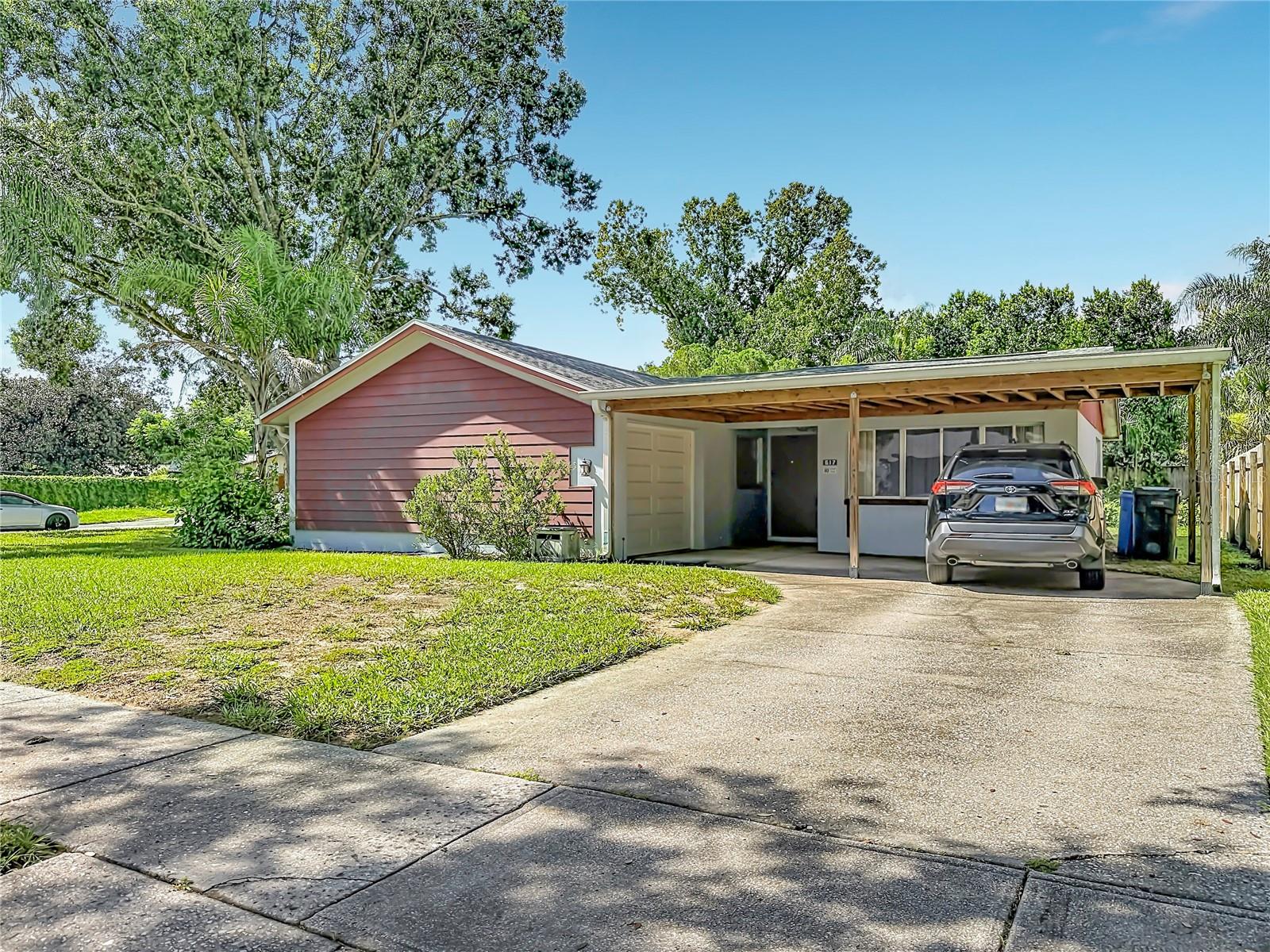 Under contract-accepting backup offers. 3-bedroom, 2-bath home situated on a spacious corner lot in an established Brandon neighborhood. A beautiful canopy oak-lined road welcomes you to this convenient location near major shopping, dining, and highways. Offering 1,022 sq. ft., this home features a galley-style kitchen with appliances, two tiled baths, a 1-car garage, additional carport parking, and a large fenced backyard with storage shed. The home needs some TLC but offers plenty of potential for a buyer ready to make it their own.