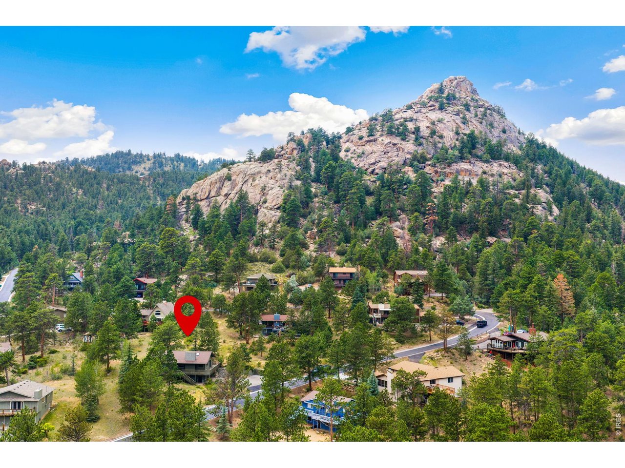 NEW PRICE-$745,000! This 3-bedroom, 2-bath Estes Park home offers 1,836 finished sq. ft. on 0.43 acre. Features include skylights, granite countertops, new carpet, a freshly painted wraparound deck, an attached 2-car garage, an extra-wide driveway, and no HOA. The seller will have the interior freshly painted. Convenient to downtown Estes Park and Rocky Mountain National Park. Schedule your showing today!