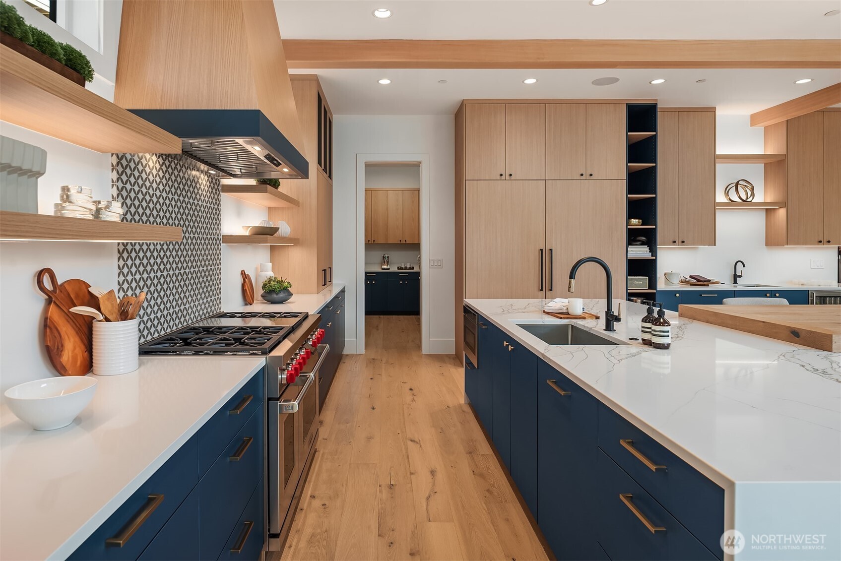 Kitchen with premium range and open shelving