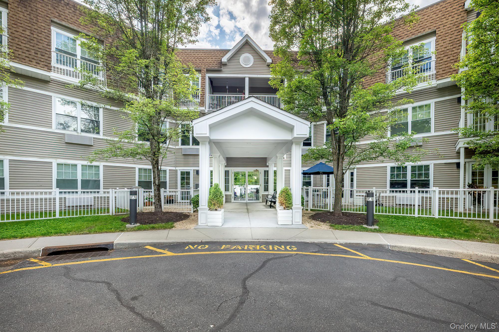 Welcome to effortless, elegant living at Sutton Manor, one of Mount Kisco’s most sought-after 55+ communities! This bright second-floor condo offers easy single-story living with a spacious primary suite with walk-in closet and full bath, a second bedroom, a second full bathroom, in-unit laundry, and a private balcony. The stylish kitchen features granite countertops, a breakfast bar, and GE stainless steel appliances. All air conditioning will be replaced with brand-new systems within the next couple of weeks, a valuable upgrade already in motion for the next owner’s peace of mind. The elevator building offers secure garage parking, a resident lounge, fitness center, and clubhouse, with the HOA covering heat and hot water for truly low-maintenance living. Conveniently located just minutes from shopping, restaurants, medical offices, Target, and Metro-North. Per HOA rules, at least one occupant must be 55 or older. Whether you’re downsizing or ready for a more relaxed lifestyle, Sutton Manor delivers the comfort, convenience, and community you deserve!
