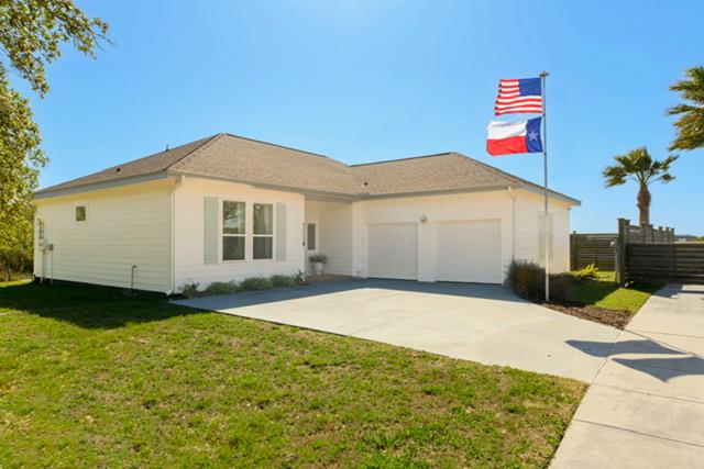 Step into coastal splendor at 101 Boardwalk Avenue, a stunning custom one-story home in the exclusive gated community of Watermark—one of the highly desirable subdivisions in the Rockport-Fulton area. Tucked in privacy, this rare enclave of just 13 homes offers the ultimate blend of charm, security and waterfront access lifestyle. Inside, soaring high ceilings and cool, elegant coastal colors welcome in the natural light and set the tone for relaxed sophistication. The chef's dream kitchen features stylish accent blue cabinetry, sleek granite countertops, eat-in bar and functional open concept to dining and living room layout—ideal for both entertaining and everyday living. The private primary suite is a true retreat, showcasing double sink vanity, a custom walk-in shower and sizable walk-in closet. Two guest bedrooms are thoughtfully split for comfort and privacy. Outdoors, enjoy a charming seating area on the back deck, complete with wooden privacy fencing for tranquil relaxation. As part of Watermark, you'll have access to an oasis-like private community pool and a scenic fishing pier stretching into Aransas Bay—perfect for unwinding or casting a line. With its stylish location, gated security, and rare waterfront access, this home delivers the coastal lifestyle you've been waiting for.