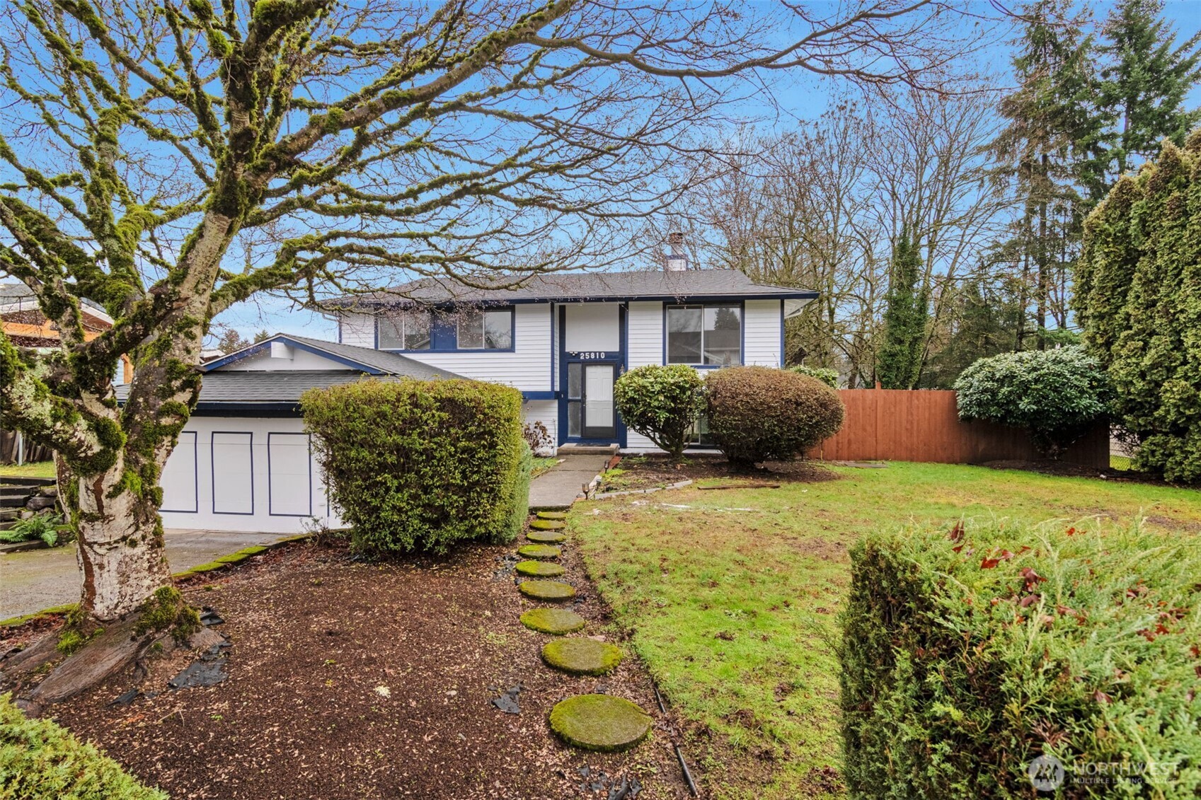 Mid-Entry Home in Rainier View Estates w/ 4 Bedrooms, 2 Full Baths & Great Location!  Over Sized Deck & View of Foothills! 3 Bedrooms Up -continental access from Master Bedroom to Bathroom. Good sized Utility Room down & Family Room w/ Back Yard Access, 1 Bedroom down & Full Bathroom. Extra Large Fenced Back & Side Yard w/Garden Area. Updated both new bathrooms! New Flooring Thought out the whole house! Fresh Paint interior thought out the whole house!  Move-In Ready!!