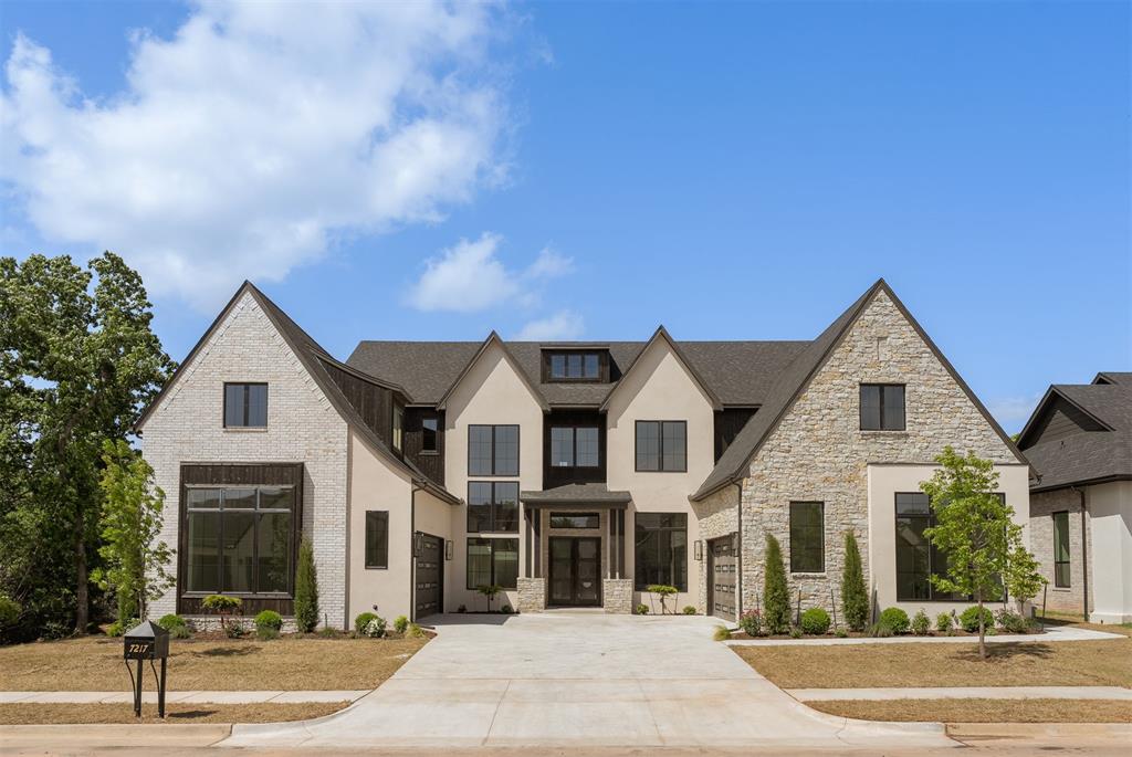 Builder now offering 25K your way to be used towards upgrades, closing costs- you name it! A Six-Time Award winning home in the 2026 Parade of Homes. This home captivates from the moment you arrive, showcasing striking symmetry and dual two-car garages. The detailed concrete work in the driveway offers a preview of the thoughtful design carried throughout the home.Spanning 4,310 square feet, this luxury residence features 4 bedrooms, 3.5 bathrooms, a private office, a butler’s pantry, a 4 car garage, and two spacious bonus rooms. The main level offers an inviting living area, a beautifully designed kitchen with butler’s pantry, a private guest suite with full en-suite bath, a dedicated office, a powder bath, and the primary suite. The laundry room is thoughtfully positioned with access from both the hallway and the primary closet.With multiple garage entries, each entrance is complemented by a built-in mud bench and drop zone.Upstairs, you’ll find two additional bedrooms, a full bathroom, and two expansive bonus spaces. One bonus room spans 32 feet and features vaulted ceilings, chandeliers, and a wall of windows overlooking the trees—ideal for a homeschool room, yoga studio, media room, home gym, or library. It would also make the perfect space to host events or parties. The lot next door can be purchased to create the perfect back yard escape! Cottage Grove offers luxury living with wooded walking trails, a fishing pond with a fountain, and a neighborhood park. Conveniently located just minutes from Crest, Sam’s Club, dining, and shopping.