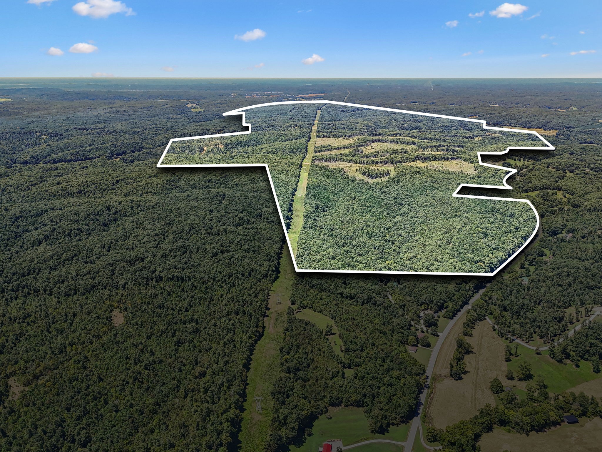 Welcome to Pumpkin Creek, an exceptional 647.25± acre timber, recreational, and hunting property located approximately one hour west of Nashville. Carefully managed for timber and wildlife for the past 25 years, the property features approximately 180 acres of recently harvested and replanted pine, along with impressive stands of mature hardwood timber, predominantly white oak. An excellent internal road system provides access throughout the property, with miles of established trails and multiple established food plots for wildlife. Located in an area characterized by substantial rural landholdings, including several properties of similar size, Pumpkin Creek offers privacy, recreation, timber value, and long-term investment potential. Large, well-managed tracts of this size and proximity to Nashville are becoming increasingly rare.