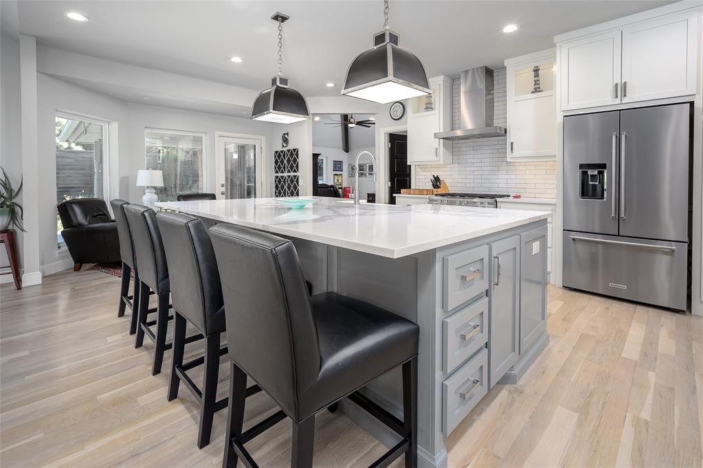 HUGE PRICE IMPROVEMENT!  This is classic Brookhaven at its best!  Originally built by John Tune and completely remodeled by Byrd Construction in 2019.  This is a spacious 3,030 square foot, 4 bedroom, 3 bath, 2 car home, with a gas log fireplace in the living room, and a large second living area right off the kitchen.  Huge kitchen island, with matching man-made quartz in the baths, stainless appliances, and a formal dining room and butler's pantry!  Tons of natural light, solid oak flooring, lots of storage and many other details and elegant extras were added during the remodel.  Beautifully landscaped, underground sprinkler system, storm shelter, and the backyard is a pollinator/wildflower garden!  Enjoy football games under the GreenOkie pavillion, complete with wood-burning fireplace and TV hookup.  Make it a point to tour this absolute Brookhaven beauty!