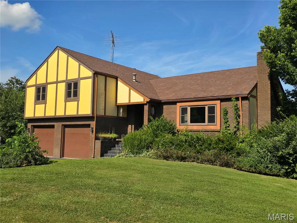 Welcome to North Woods Circle where you will find this large split level home on a spacious .60 +/- acre lot. This gem offers the perfect blend of comfort, space, and versatility. With 4 bedrooms and 2  baths, there's room for everyone to spread out and enjoy.
The main level features a formal dining room ideal for hosting gatherings, and an eat-in kitchen with ample cabinetry and natural light. Downstairs, the family room provides a cozy retreat, while the walk-out basement boasts a full recreation room complete with a second kitchen which is perfect for entertaining, multi-generational living, or game nights.
Step outside to enjoy the screened-in porch, where you can relax and take in the peaceful surroundings of the North Woods Circle Subdivision. The 2 car garage adds convenience and storage, rounding out this home's impressive list of features.
Whether you're looking for space to grow, entertain, or simply unwind, this home checks all the boxes. Schedule your showing today and discover the possibilities!