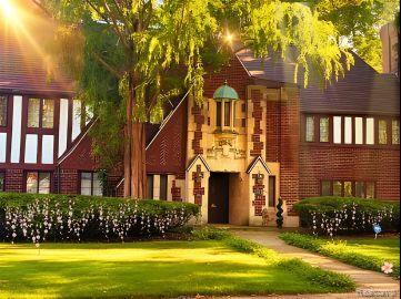 Designed by C. Howard Crane, architect of the Fox Theatre, and Olympia Stadium this home features clean, sharp lines paired with ornate paneled woods and wet plaster floral details. This stunning residence is ready for spring featuring 7 bedrooms, 3 full/ 2 half baths, & Carriage House above 3 car garage.  Detailed elegance abounds the generous floor plan with skylight's natural sunset glow from the stained-glass ceiling panel.  Home includes stones, terracotta tiles, and Pewabics. Polished wood flows throughout the home, and the grand staircase offers a striking view of the stained-glass skylight from the third fr. Welcome to urban luxury, where original woods, glass, and stone are intricately balanced to reflect the charm of the era. Third floor access from kitchen, formerly servants' quarters. Once relocated this Palmer Woods home was carefully moved to preserve the beauty the property. As IS, Seller requires proof of funding.