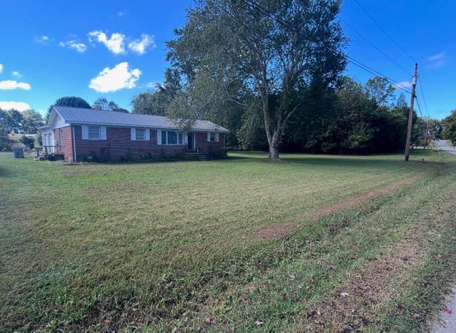 ***AT AUCTION*** October 23 @ 4:00pm. Over 1,200 square feet, 4-bedroom with 2 baths (one handicap accessible). 2 car attached garage, all on 1.3+/- acres. Also selling a 0.8+/- acre corner lot separate with the right to regroup. Preview this home and land on October 20 from 4-6pm.